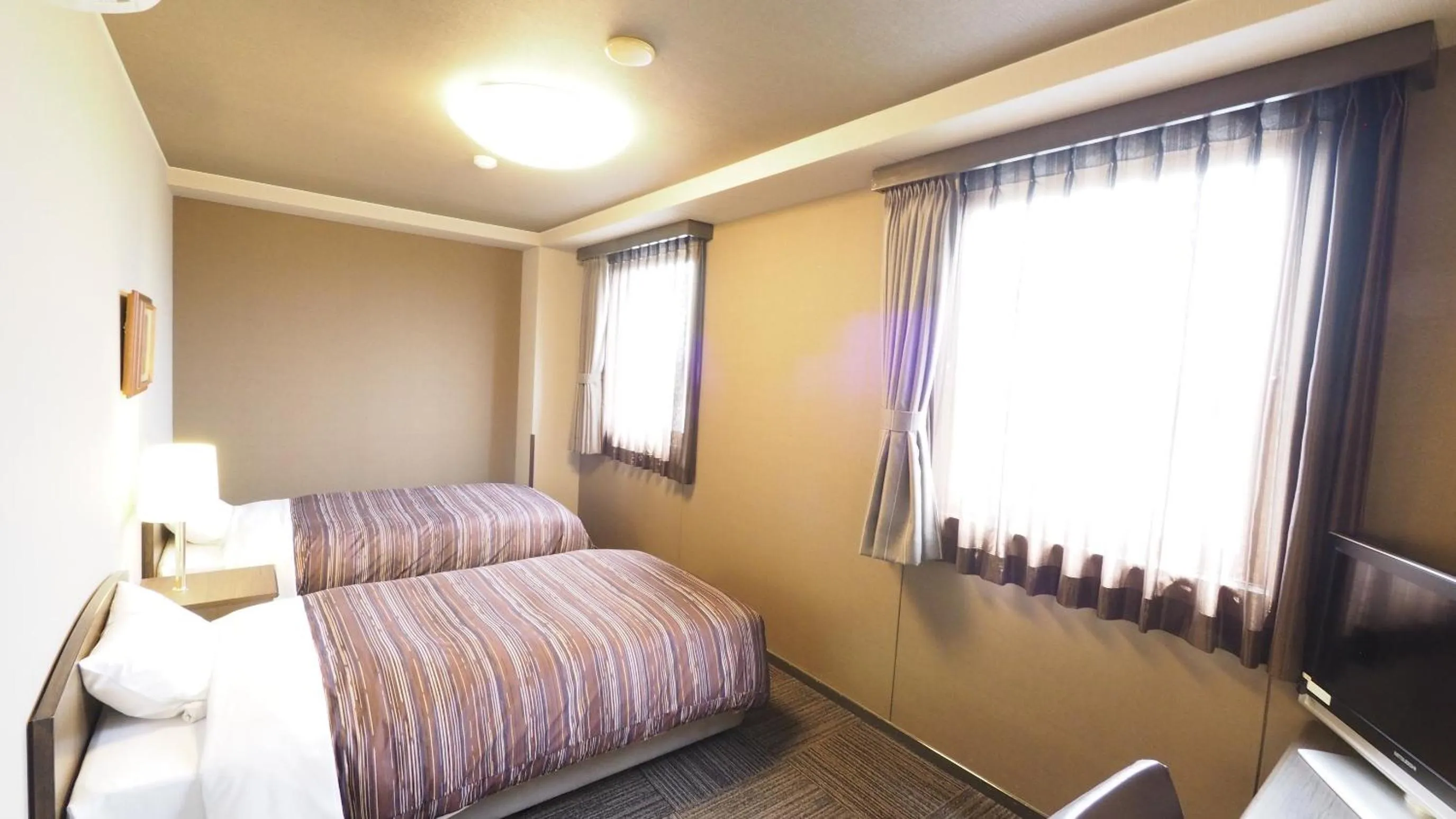 Photo of the whole room, Bed in Hotel Route-Inn Court Matsumoto Inter