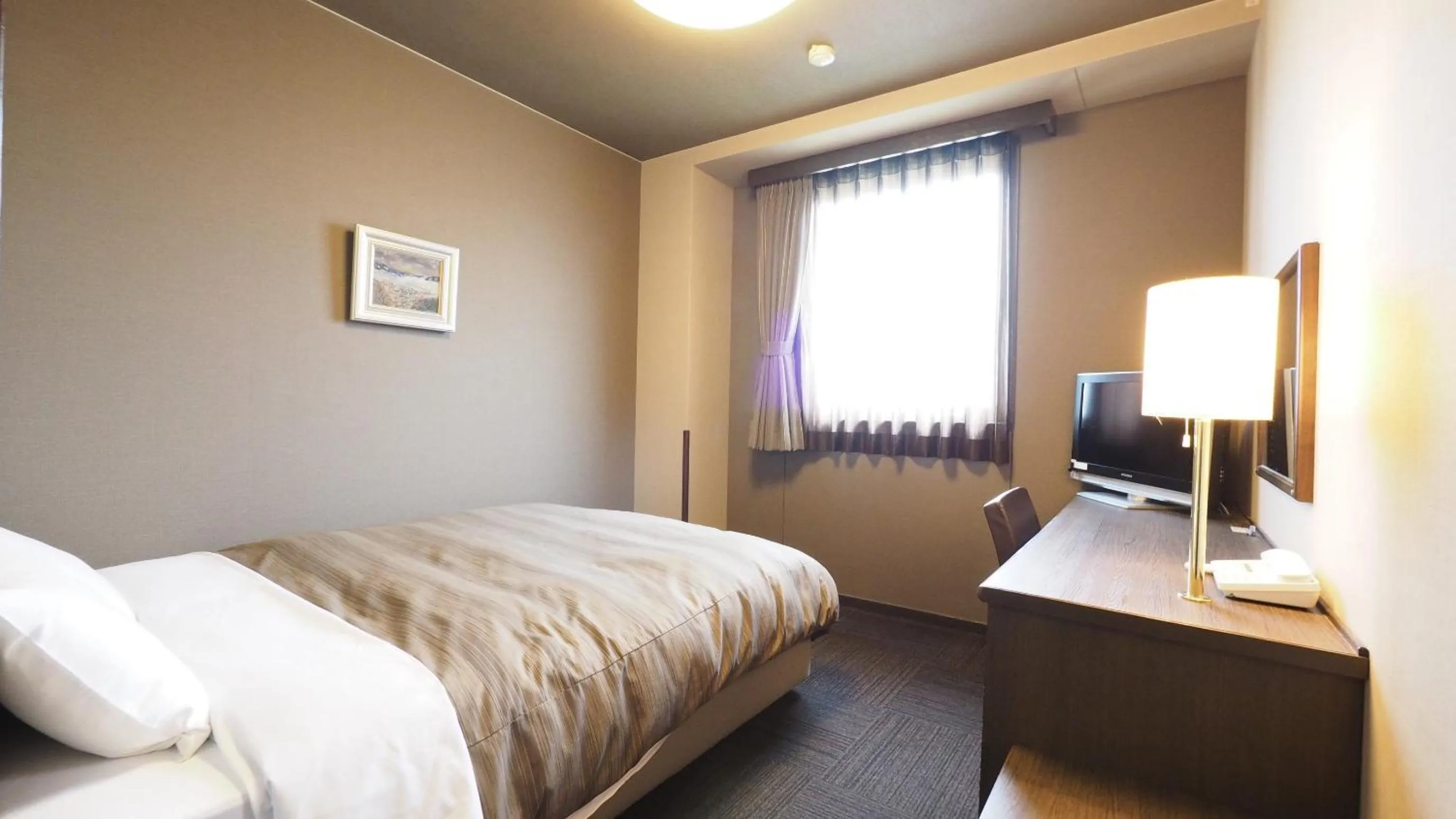 Photo of the whole room, Bed in Hotel Route-Inn Court Matsumoto Inter