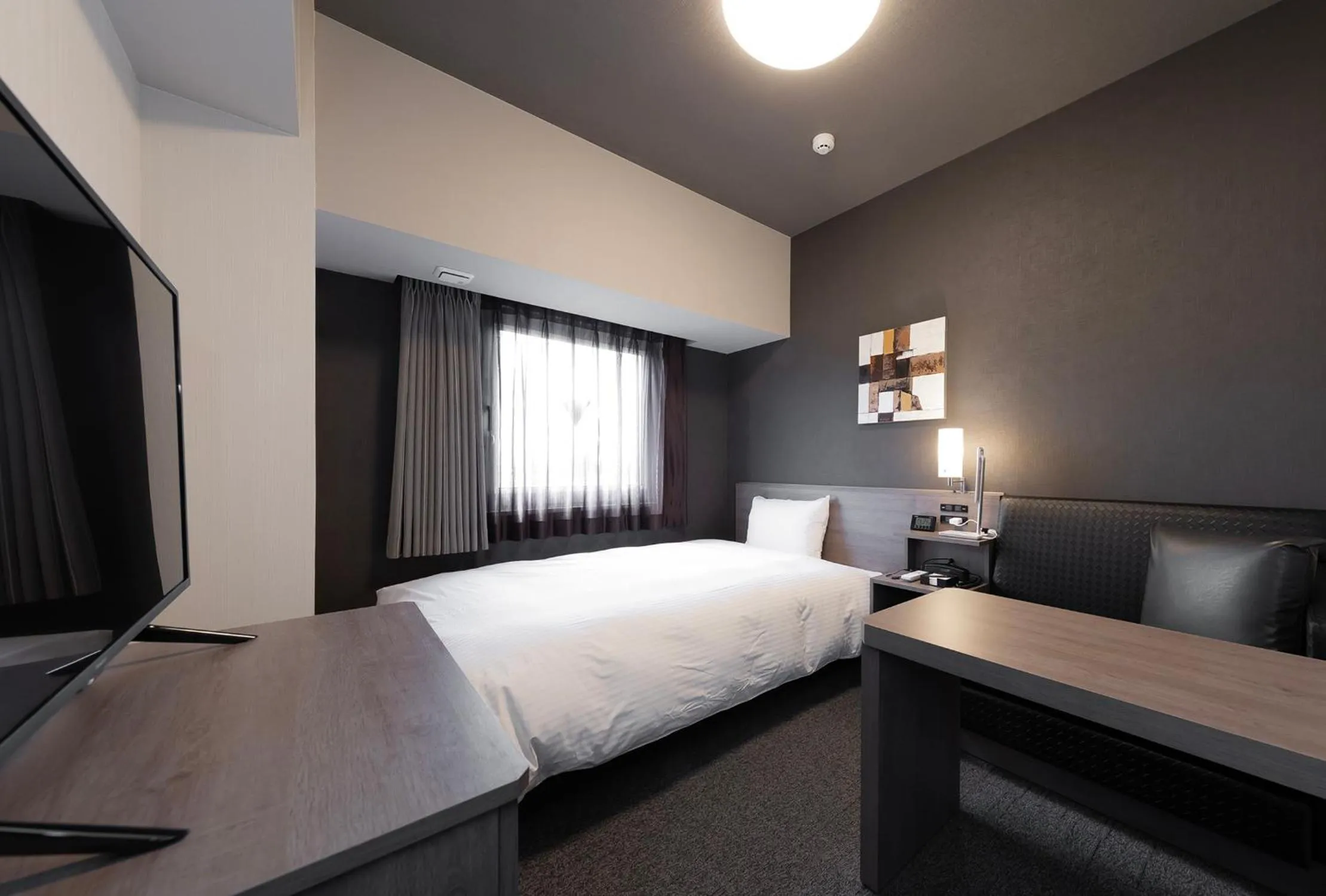 Photo of the whole room, Bed in Hotel Route-Inn Nagahama Inter