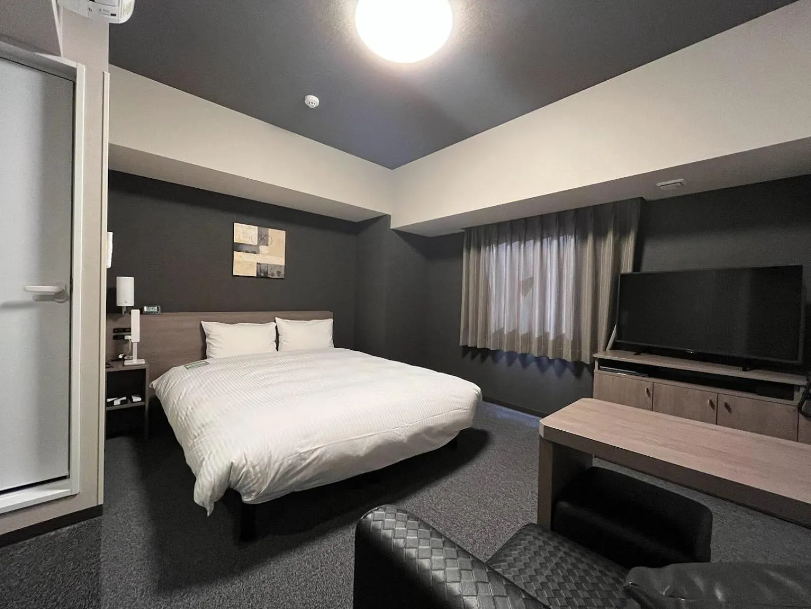 Photo of the whole room, Bed in Hotel Route-Inn Nagahama Inter