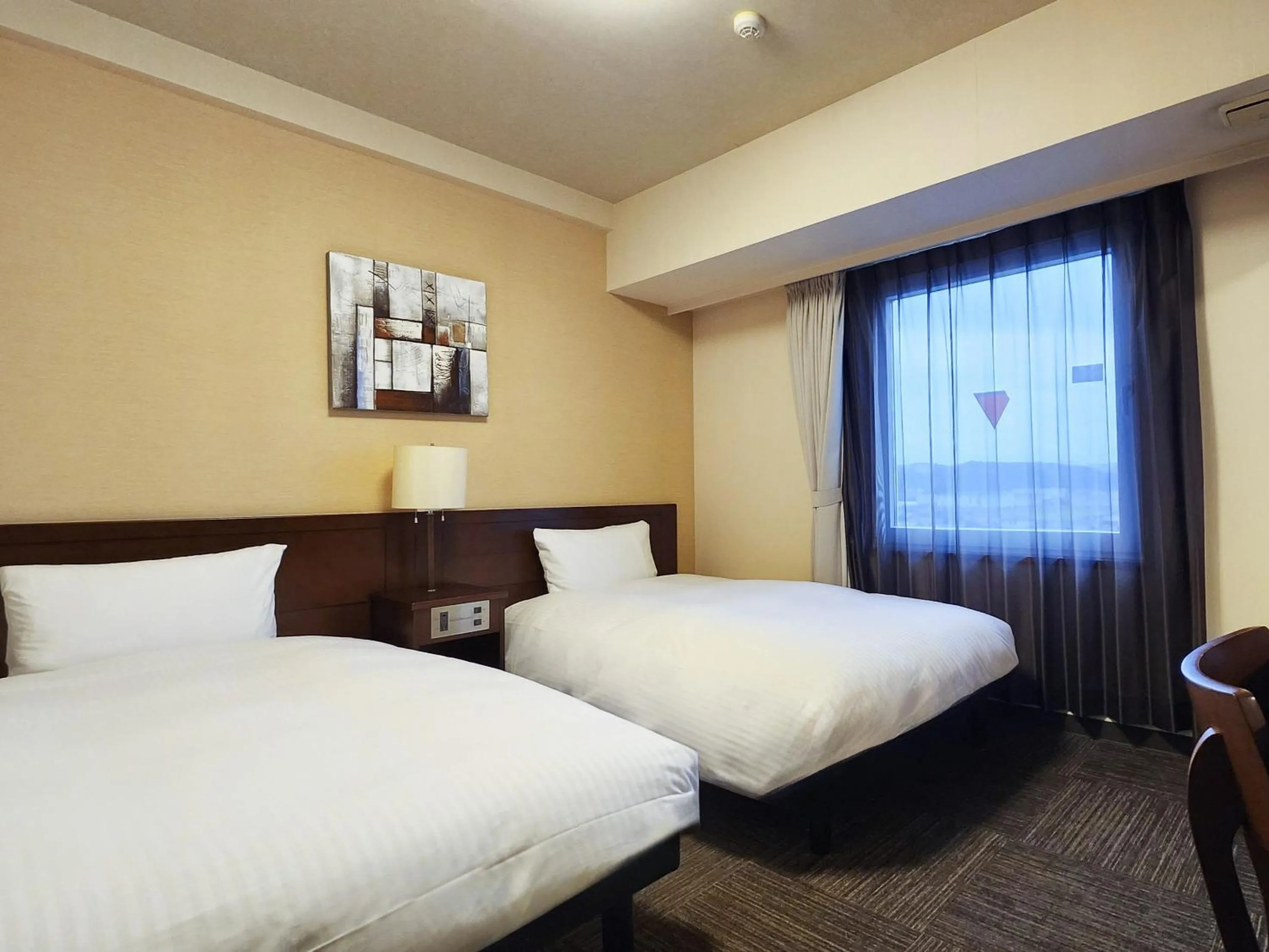Photo of the whole room, Bed in Hotel Route-Inn Nagahama Inter