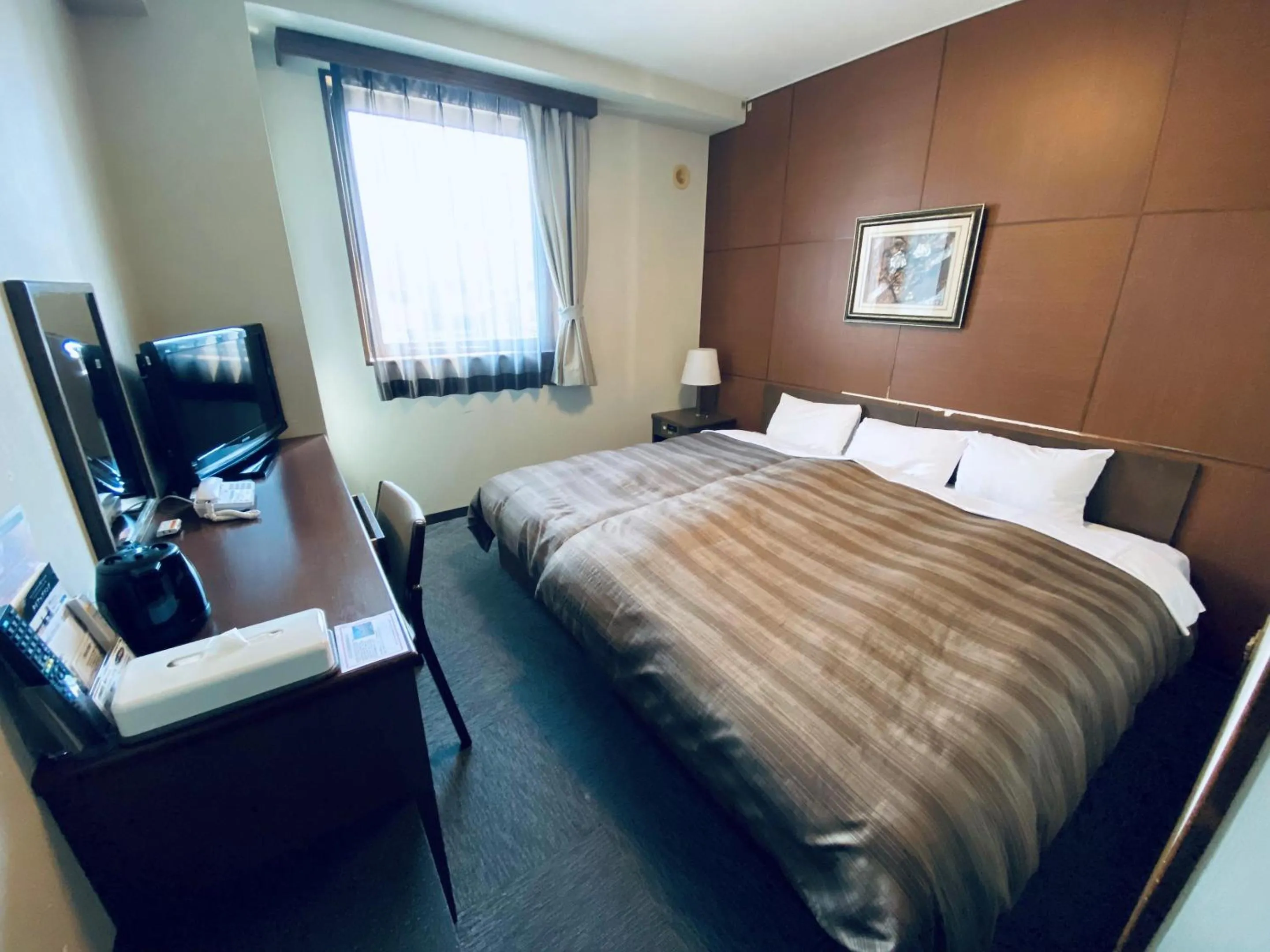 Photo of the whole room, Bed in Hotel Route-Inn Kamisuwa