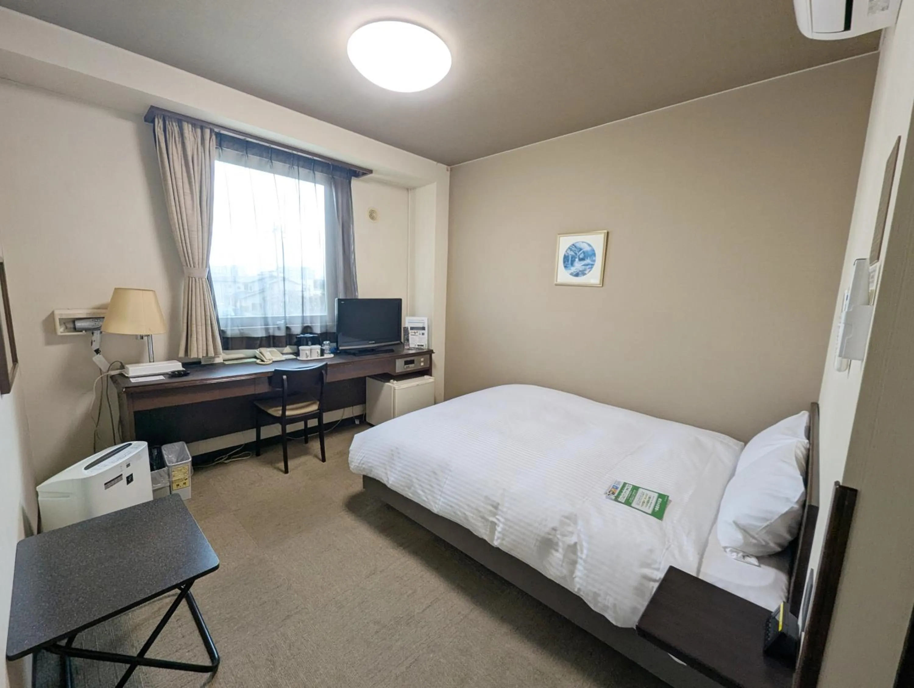 Photo of the whole room, Bed in Hotel Route-Inn Court Shinonoi