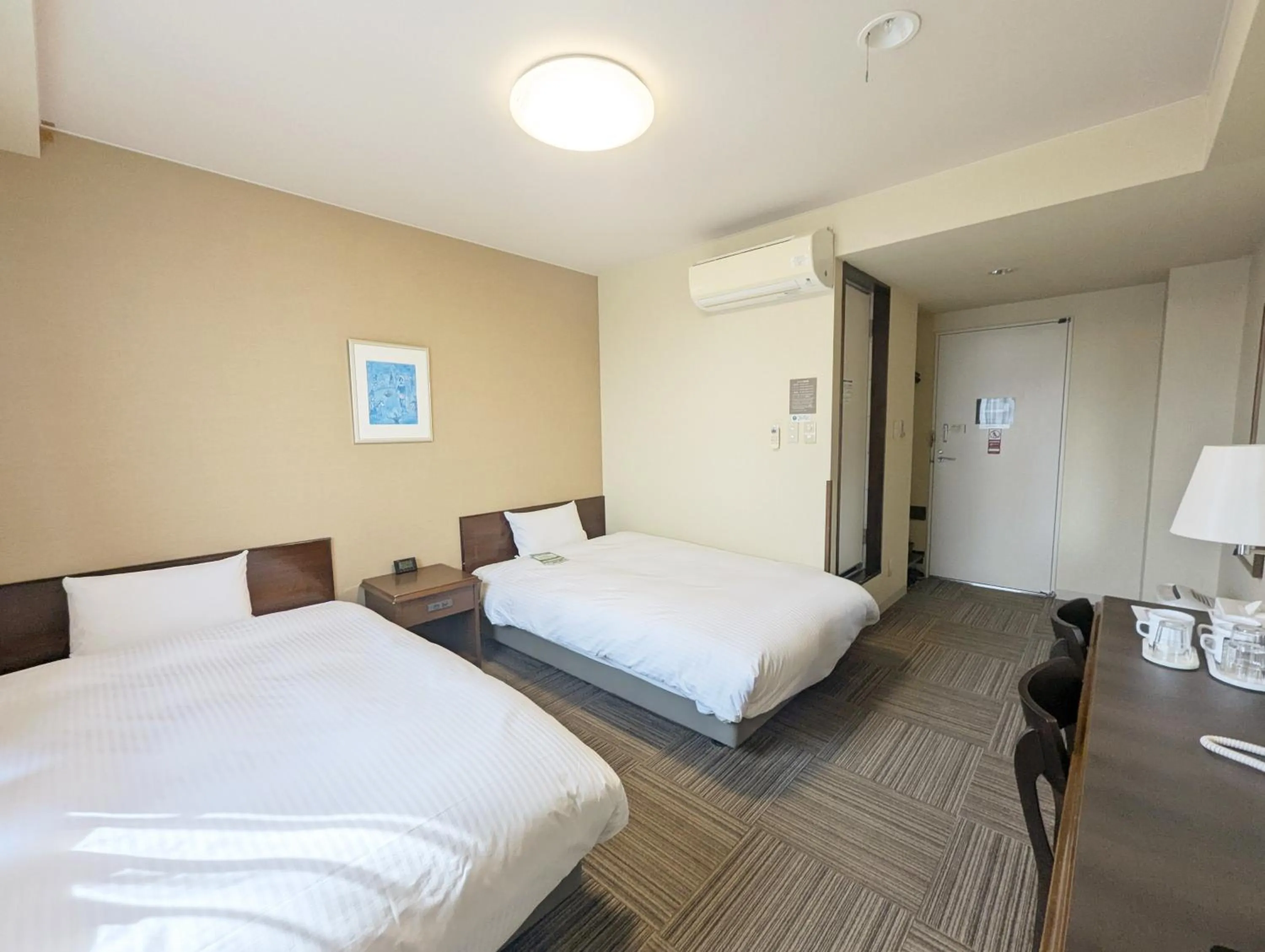 Photo of the whole room, Bed in Hotel Route-Inn Court Shinonoi