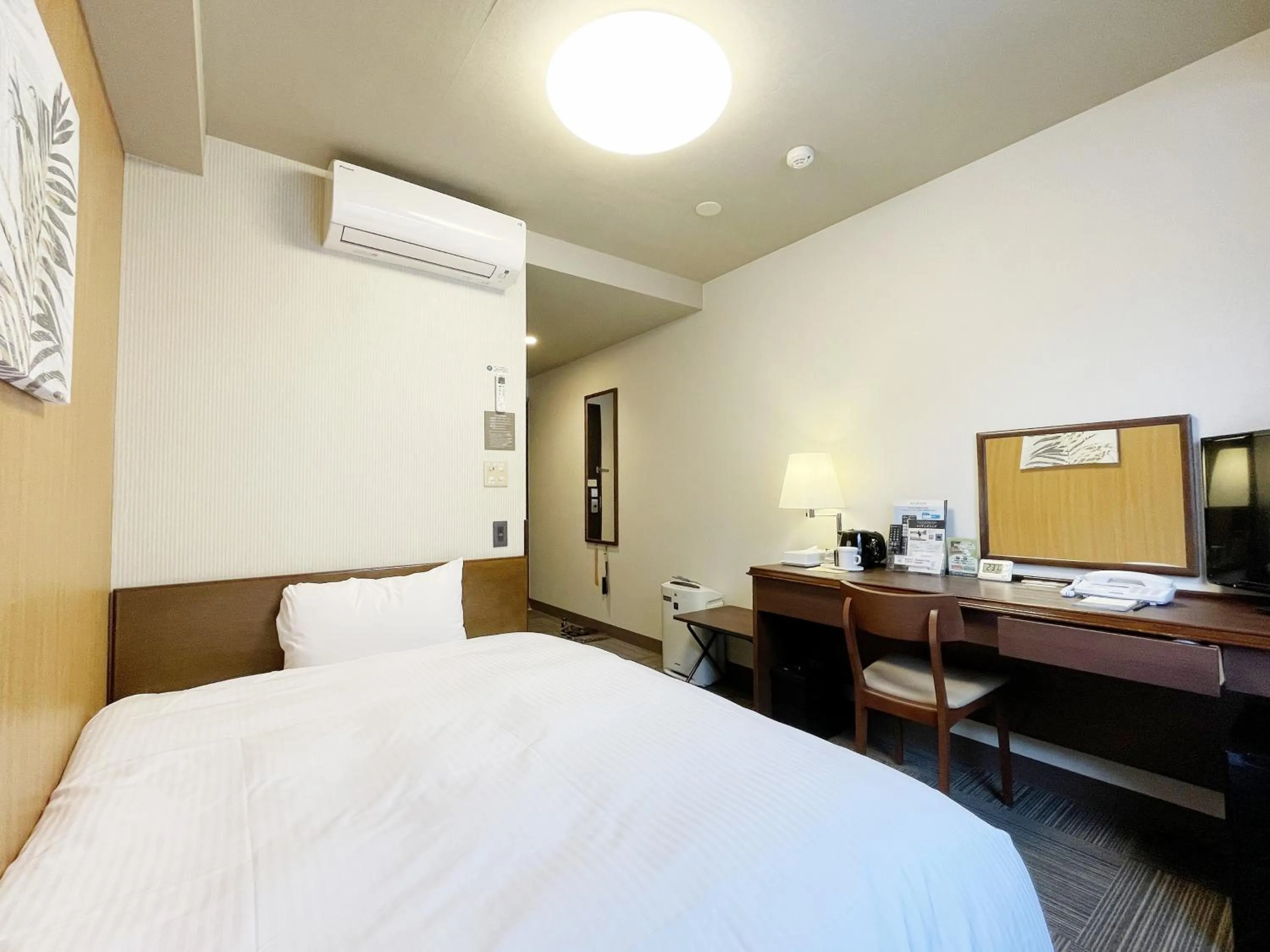 Photo of the whole room, Bed in HOTEL ROUTE-INN Kamiyamada Onsen
