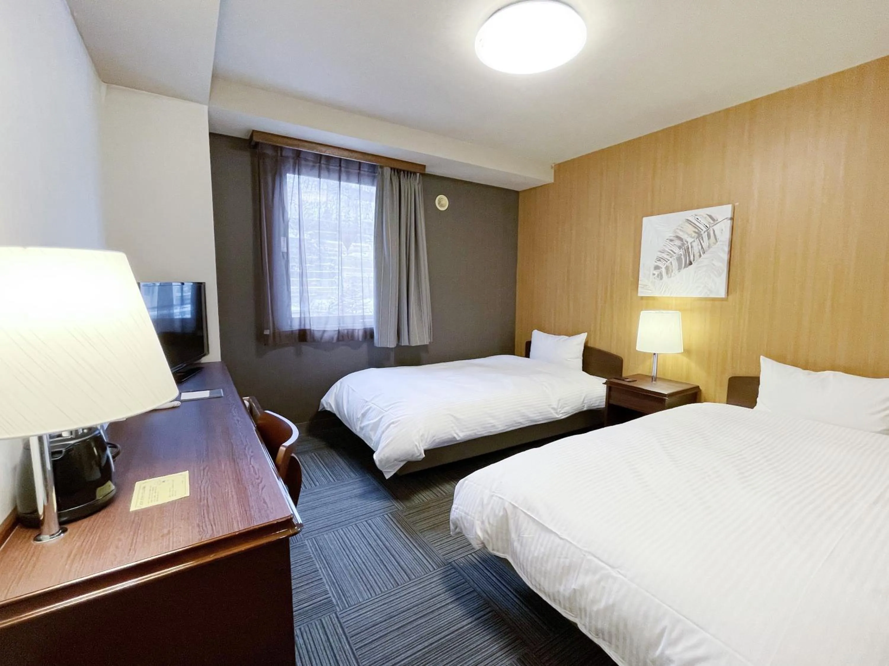 Photo of the whole room, Bed in HOTEL ROUTE-INN Kamiyamada Onsen