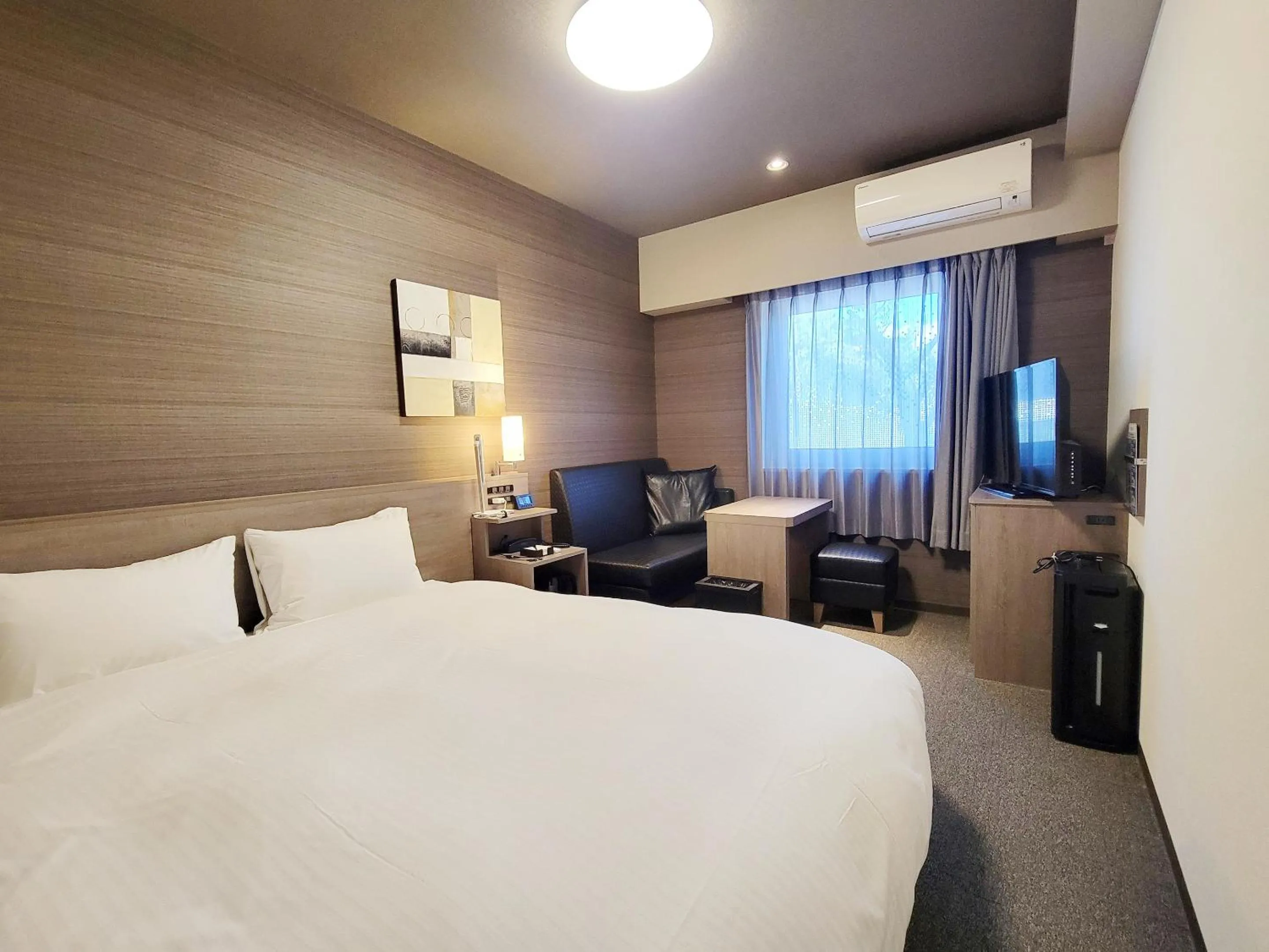 Photo of the whole room, Bed in Hotel Route-Inn Komoro