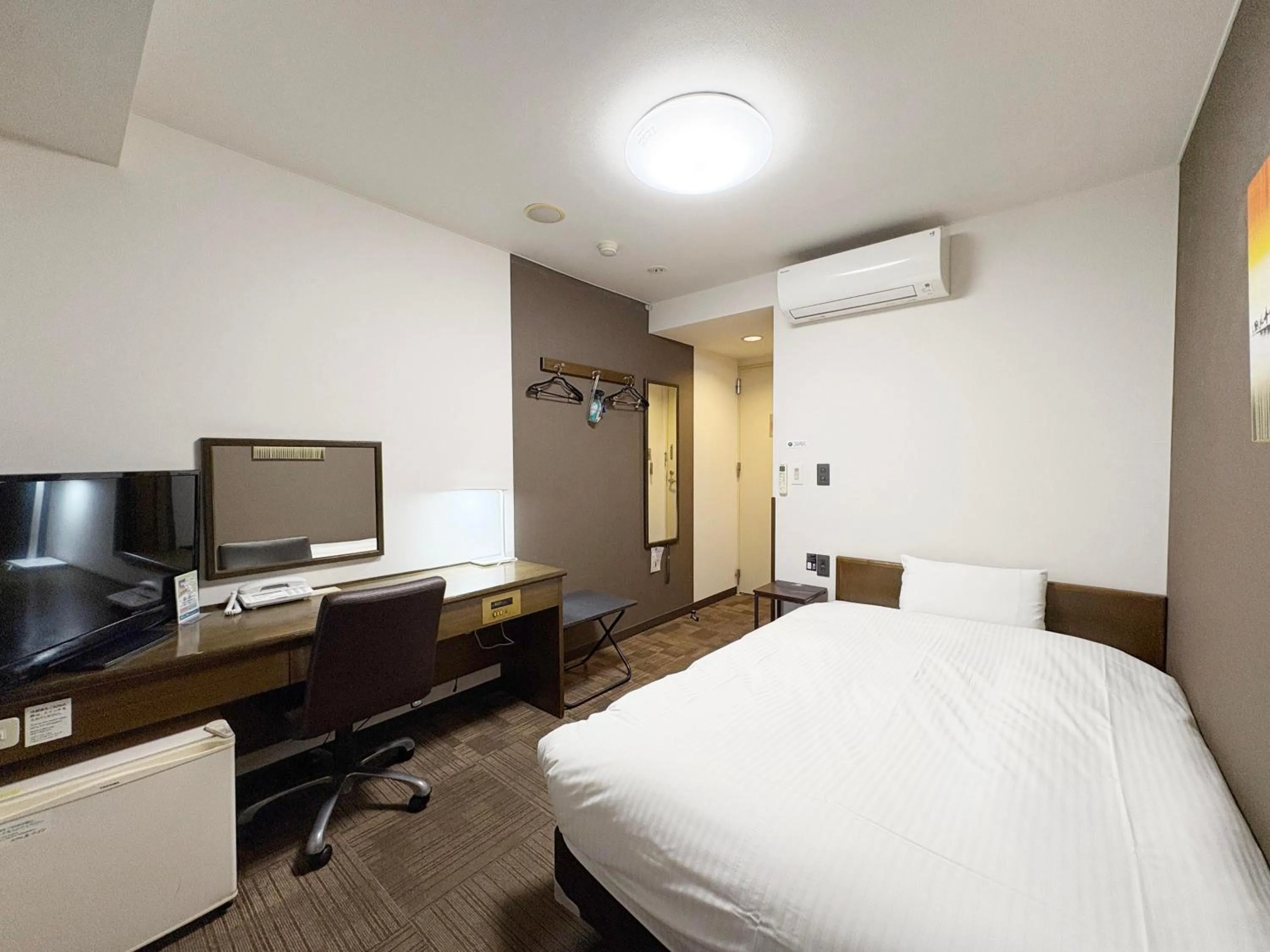 Photo of the whole room, Bed in Hotel Route-Inn Court Minami Alps