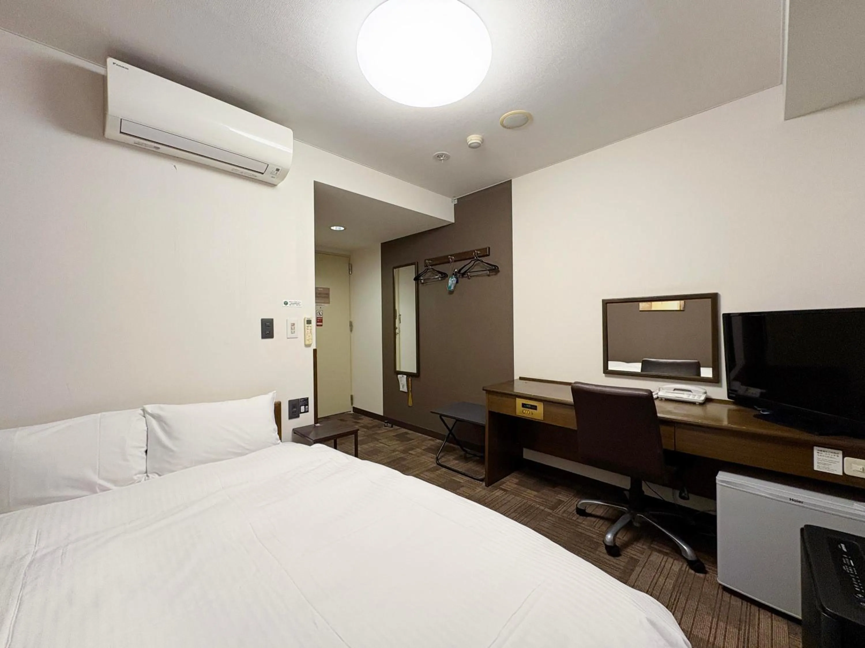 Photo of the whole room, Bed in Hotel Route-Inn Court Minami Alps