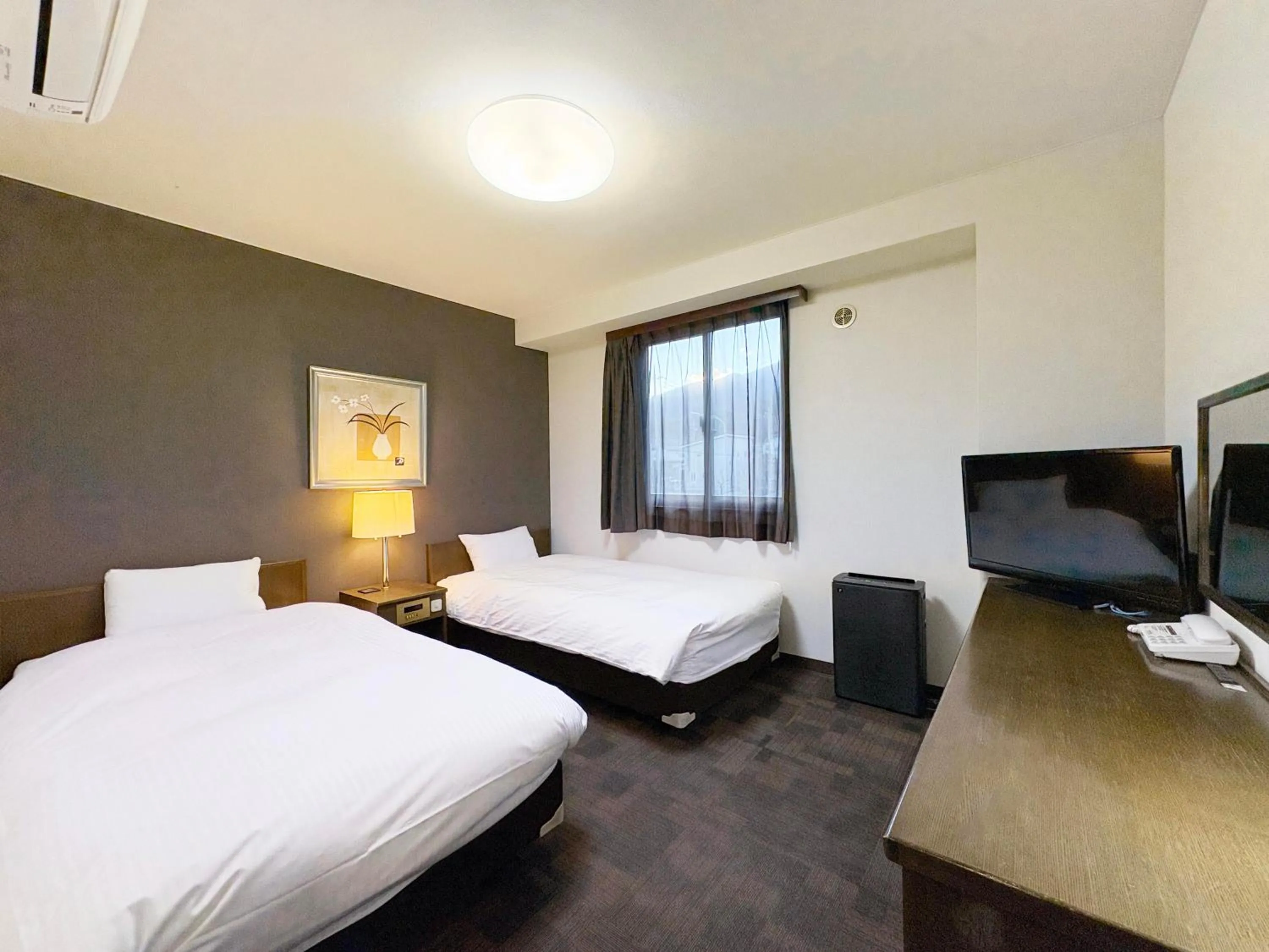 Photo of the whole room, Bed in Hotel Route-Inn Court Minami Alps