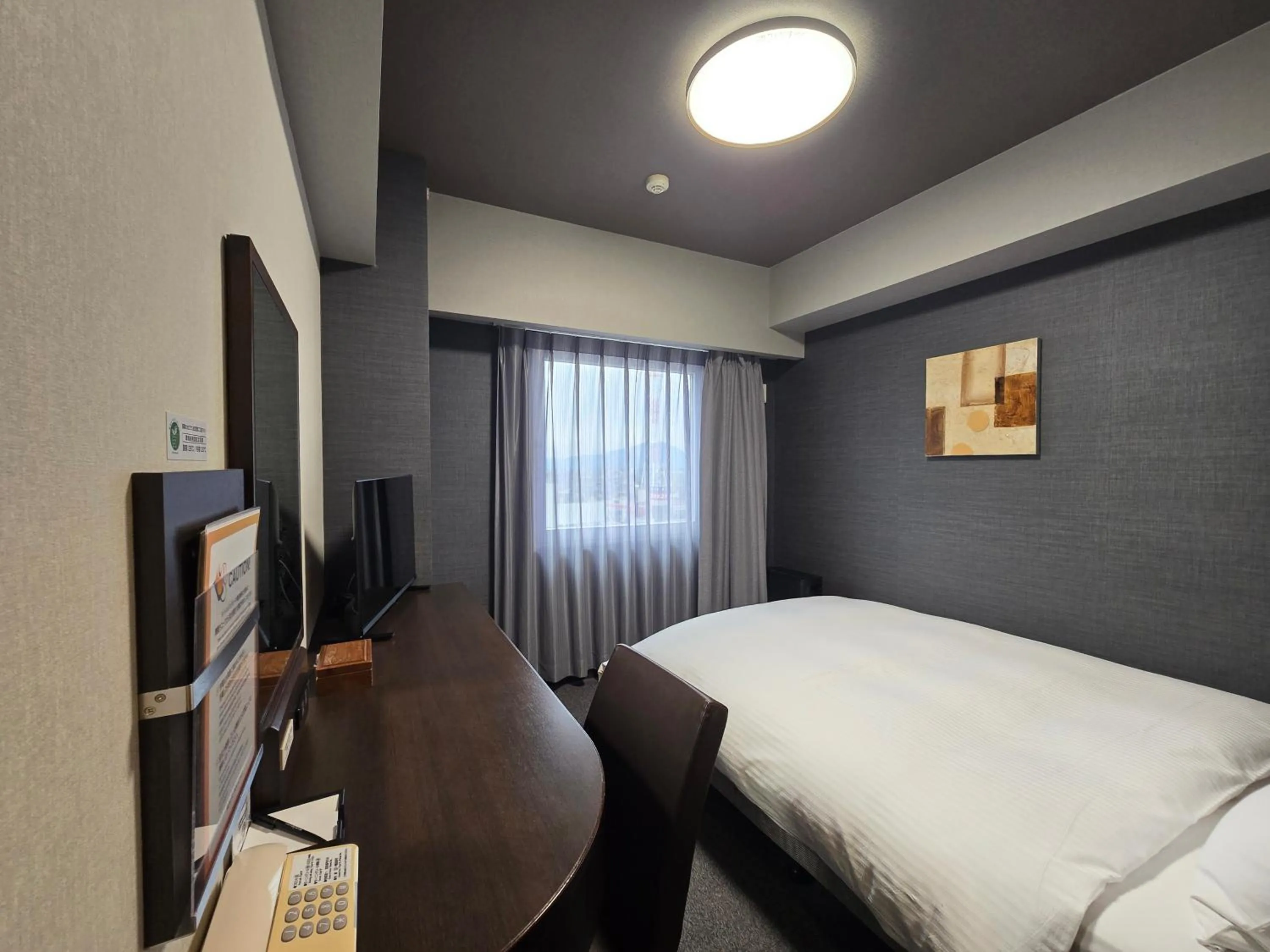 Photo of the whole room, Bed in Hotel Route-Inn Shimodate