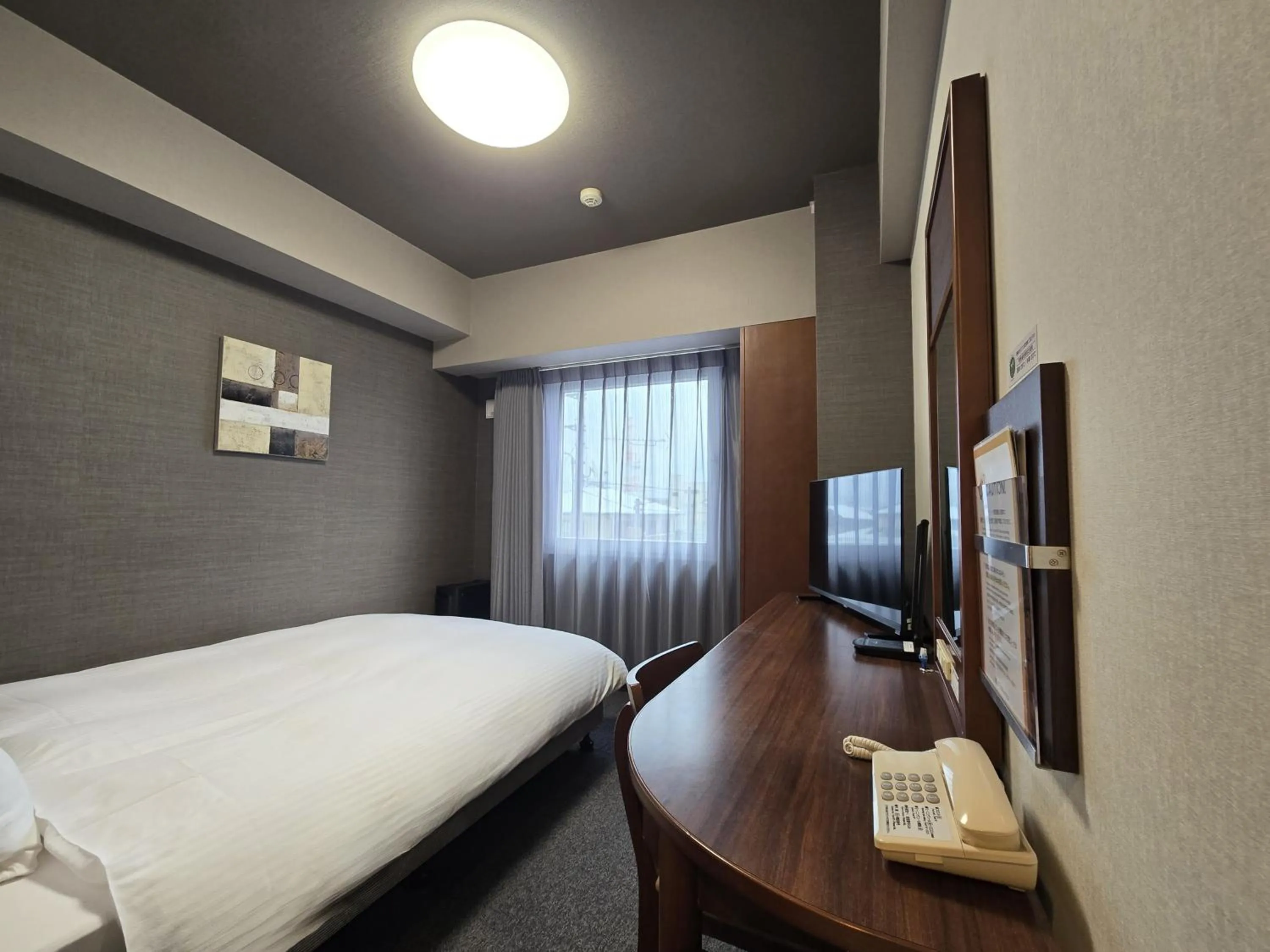 Photo of the whole room, Bed in Hotel Route-Inn Shimodate