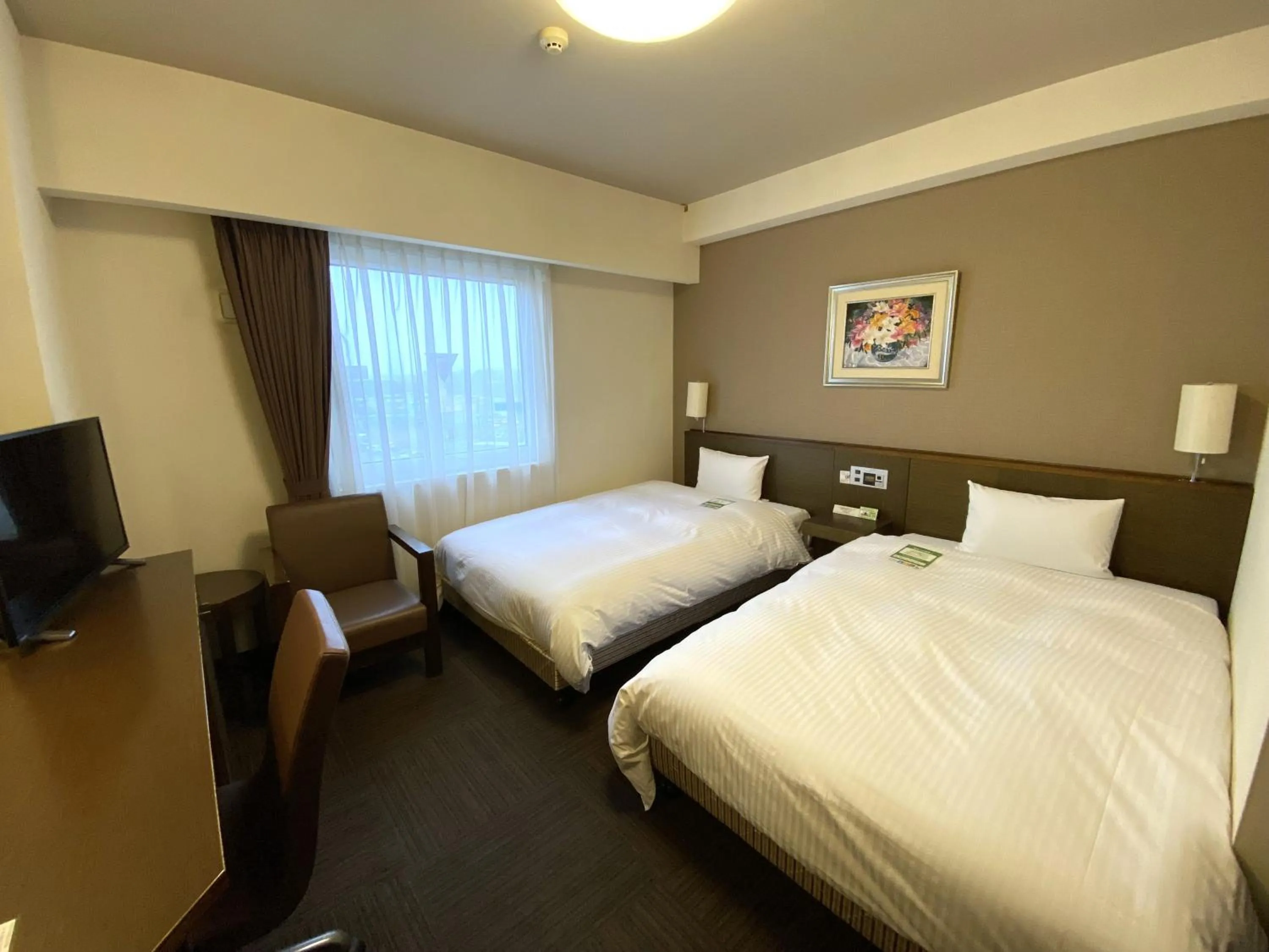 Photo of the whole room, Bed in Hotel Route-Inn Hanamaki