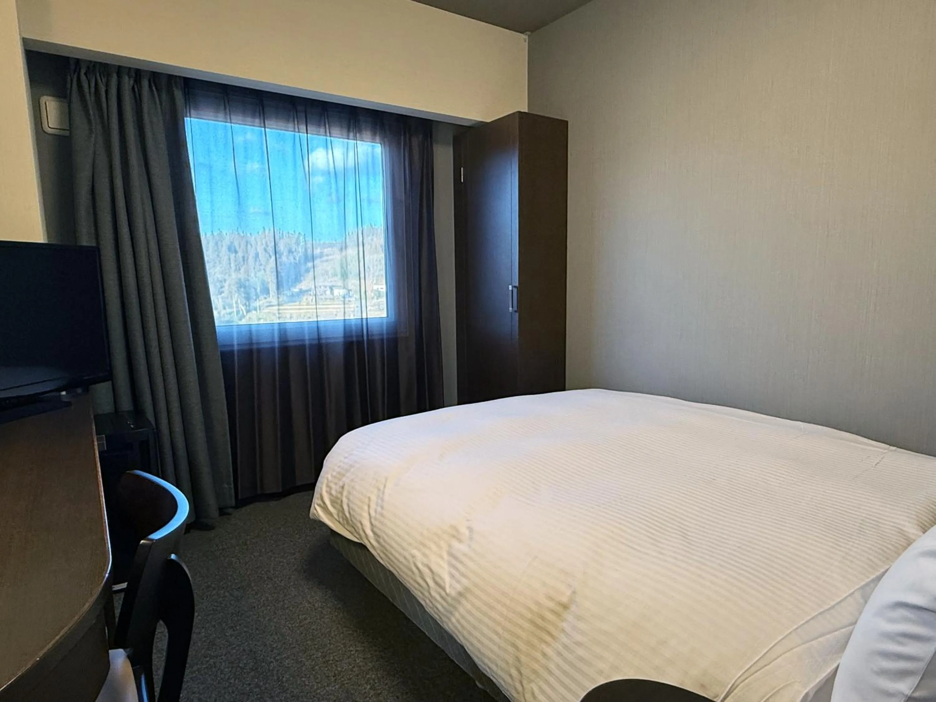 Photo of the whole room, Bed in Hotel Route-Inn Ichinoseki Inter