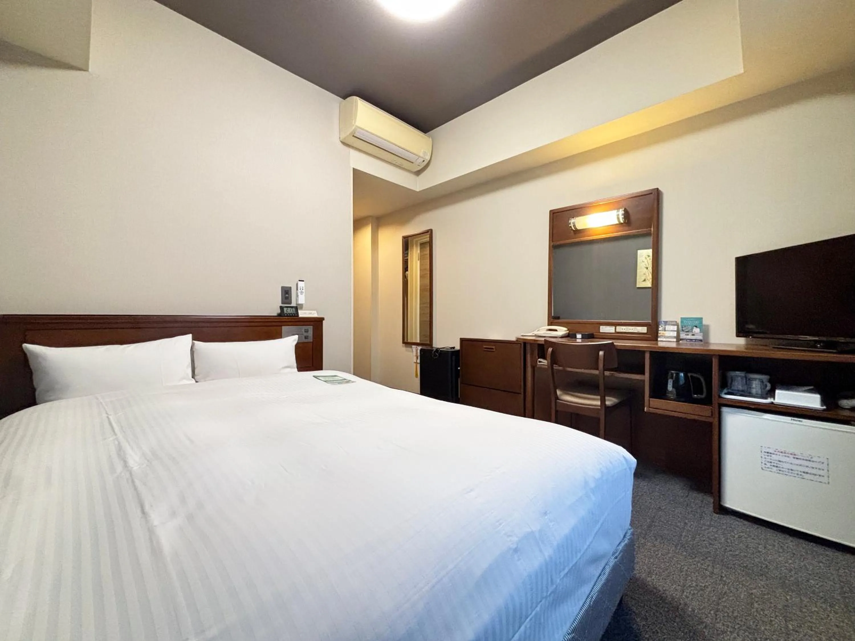 Photo of the whole room, Bed in Hotel Route-Inn Sendaiizumi Inter