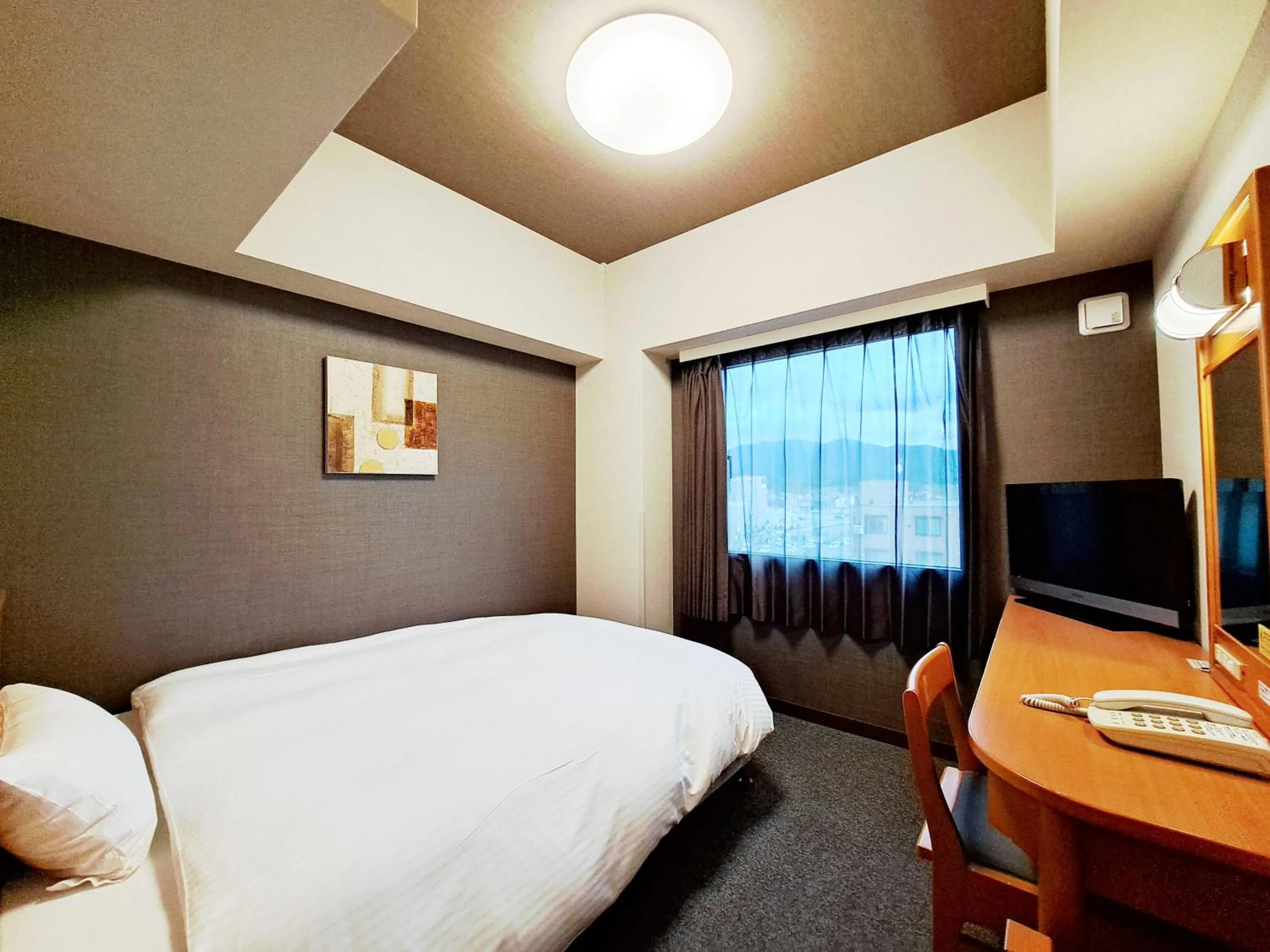 Photo of the whole room, Bed in Hotel Route-Inn Shinjyo Ekimae