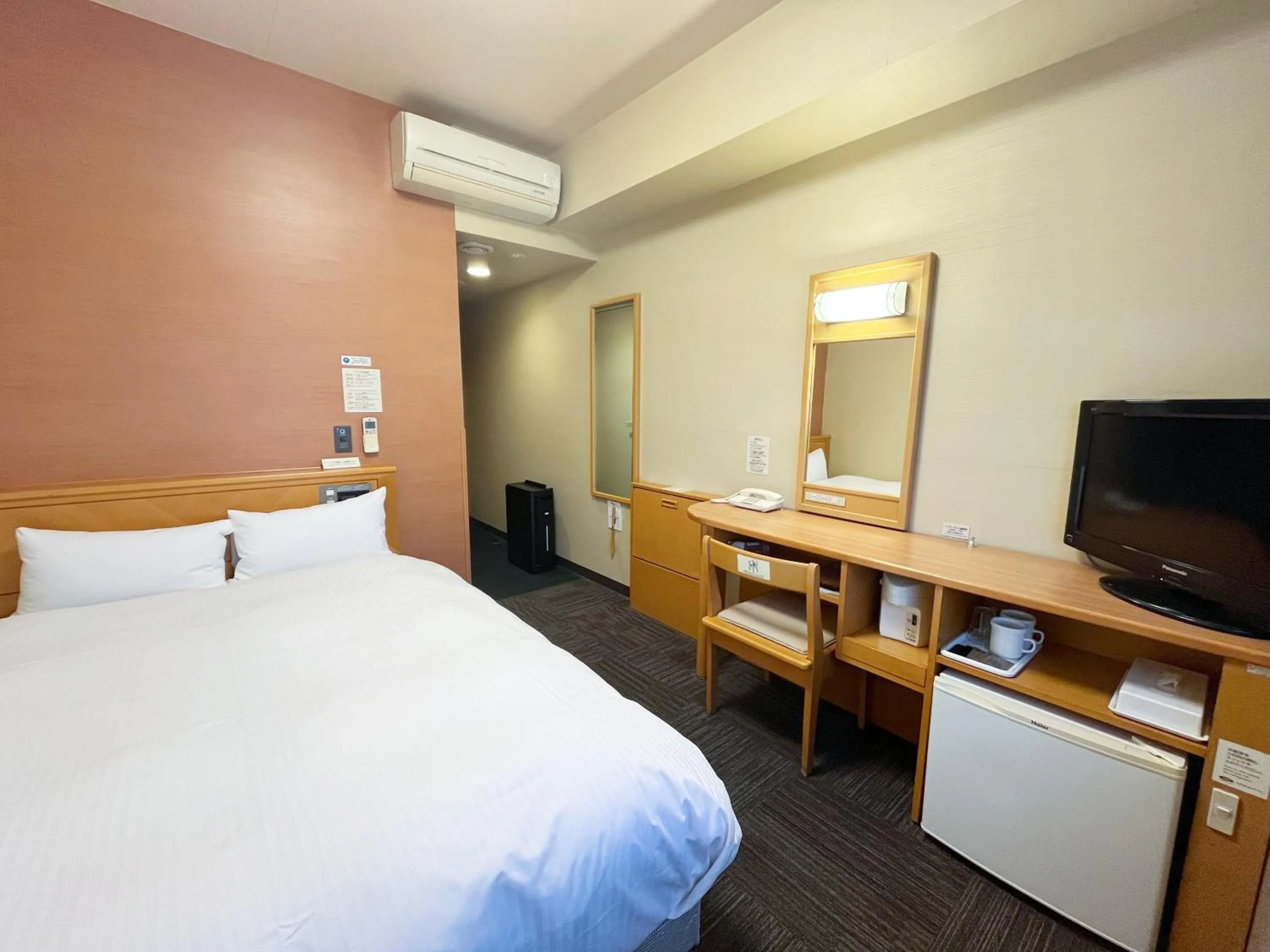 Photo of the whole room, Bed in Hotel Route-Inn Yamagata Ekimae