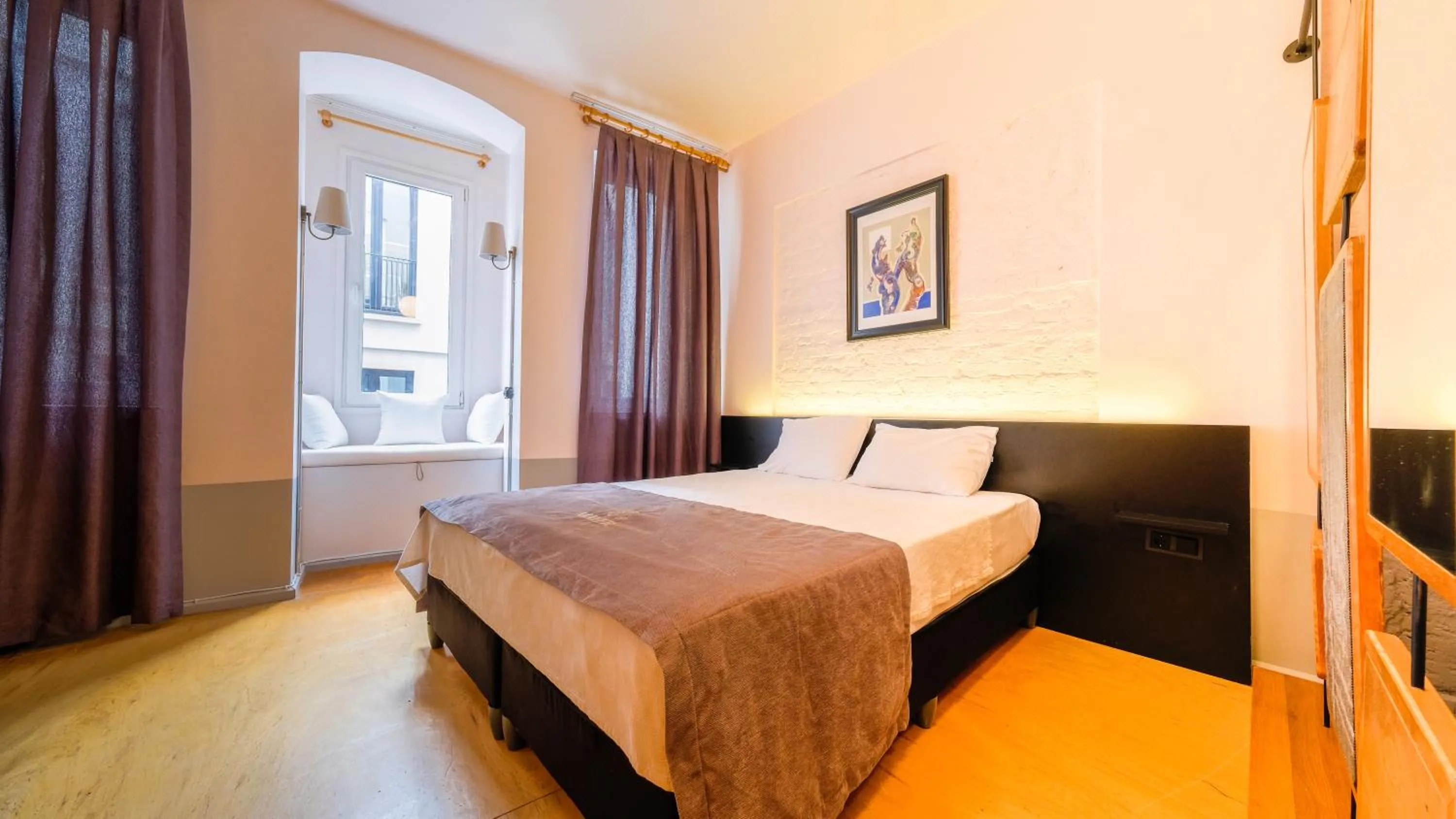 Bed in Mayer Loft Suites