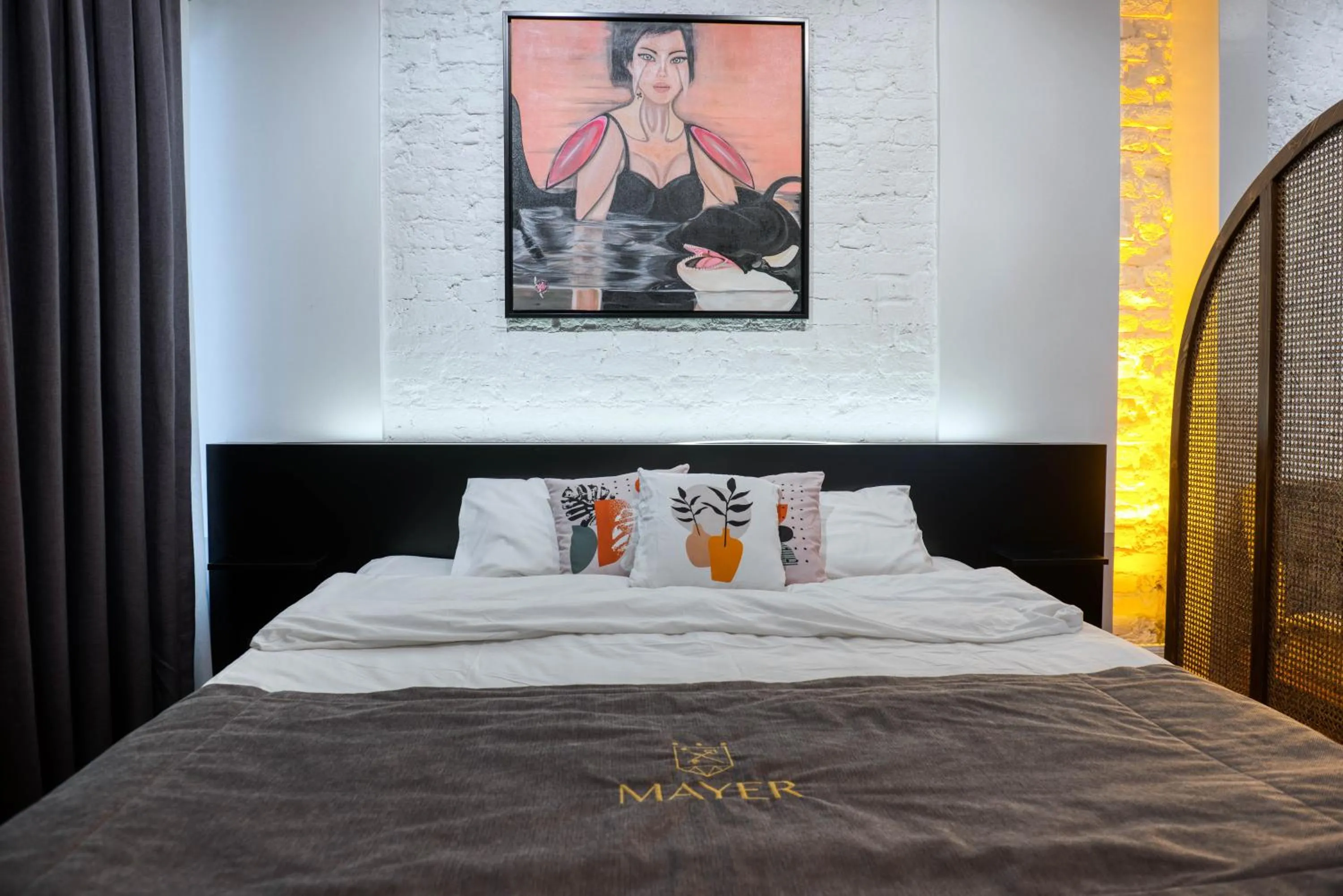 Bed in Mayer Loft Suites