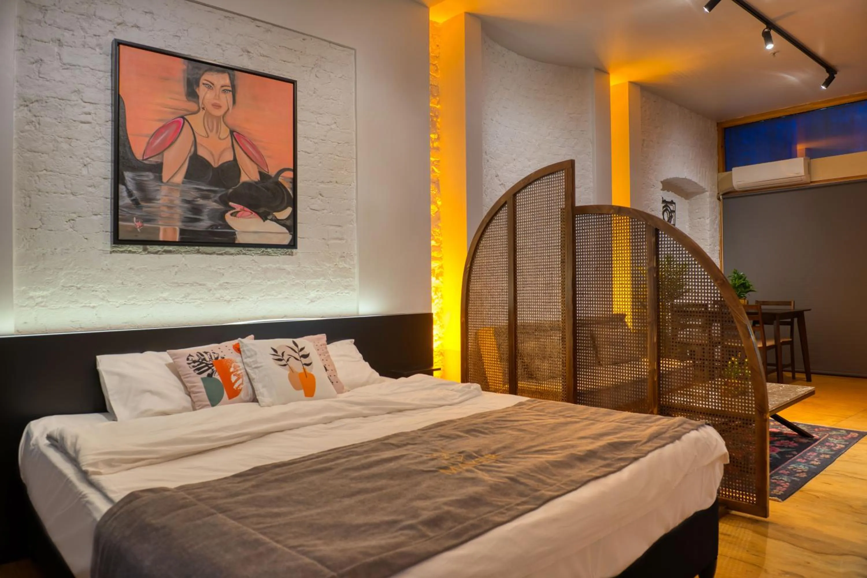 Bed in Mayer Loft Suites