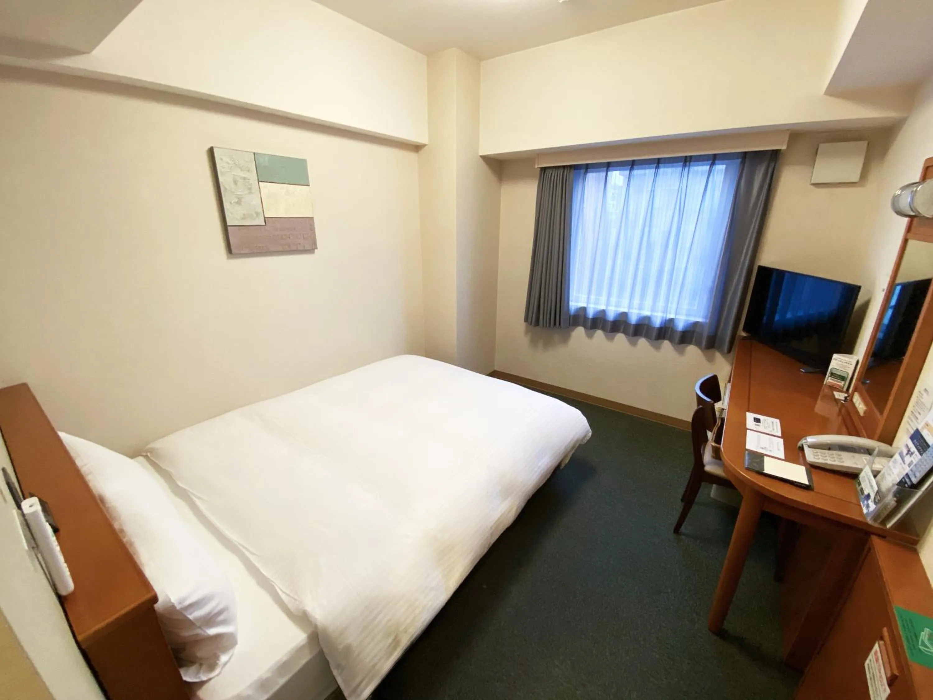 Photo of the whole room, Bed in Hotel Route-Inn Fukaya Ekimae