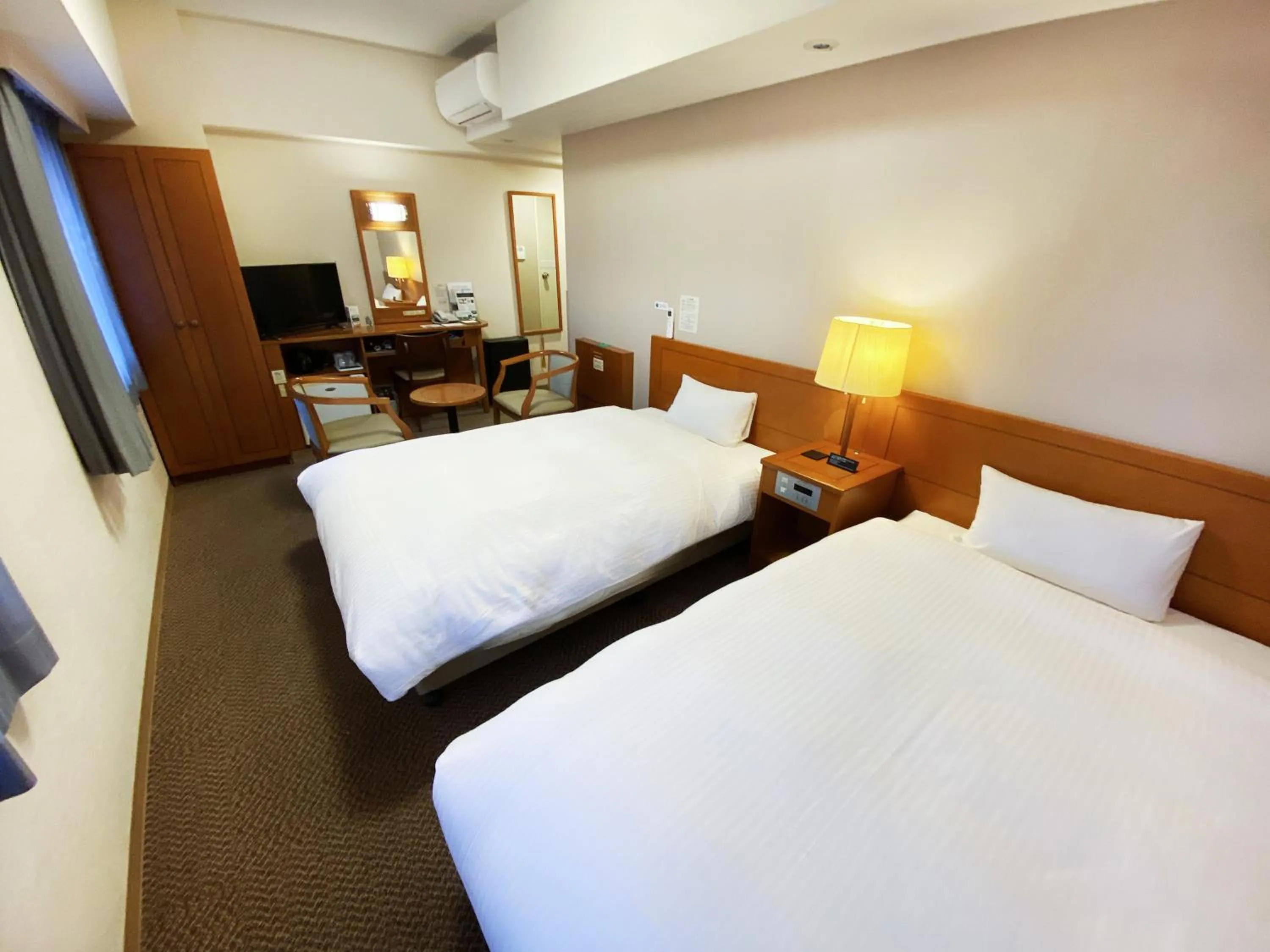 Photo of the whole room, Bed in Hotel Route-Inn Fukaya Ekimae