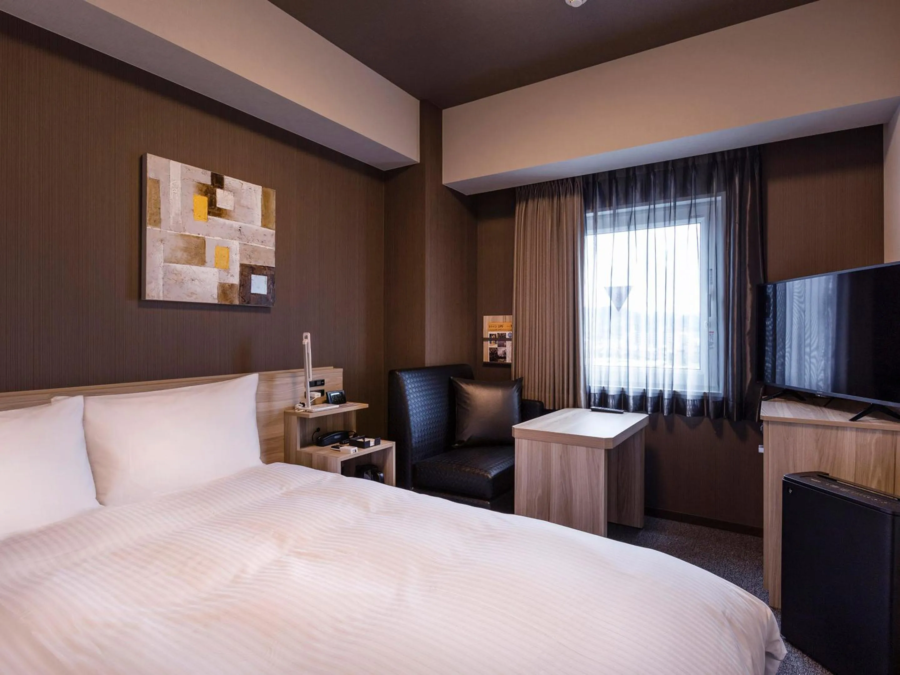 Photo of the whole room, Bed in Hotel Route-Inn Kitamatsudo Ekimae