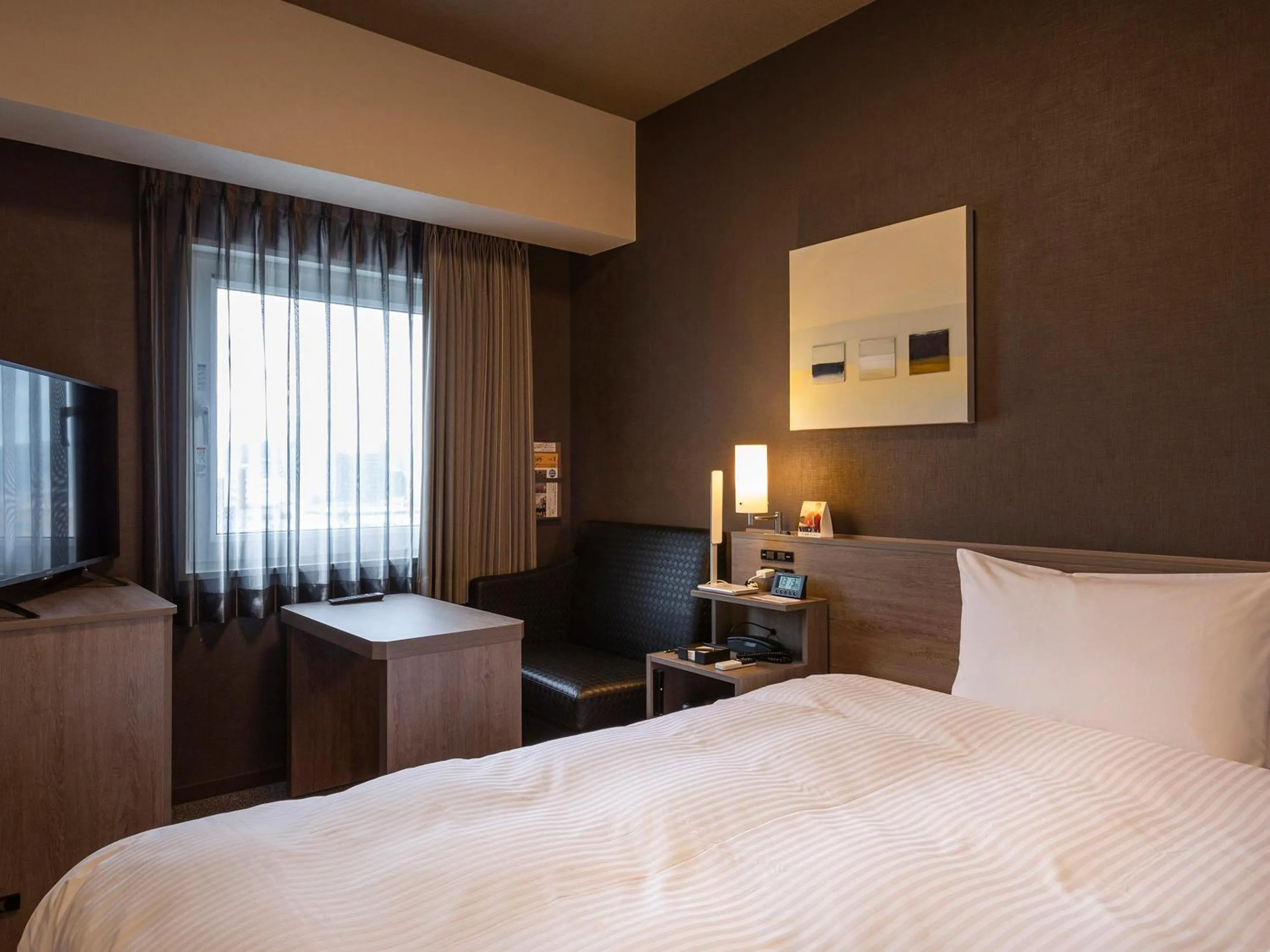 Photo of the whole room, Bed in Hotel Route-Inn Kitamatsudo Ekimae