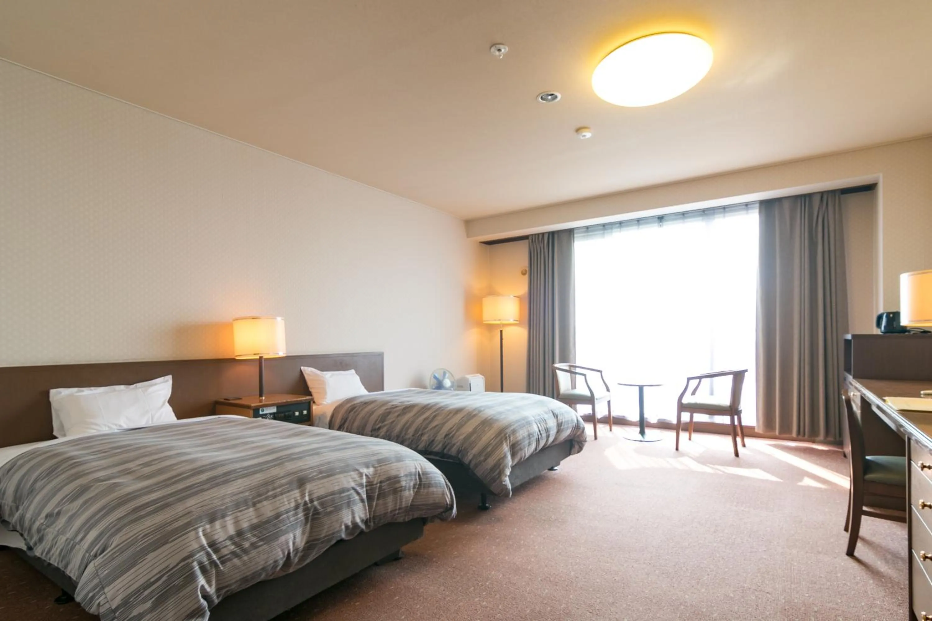 Photo of the whole room, Bed in Tokachi Makubetsu Onsen Grandvrio Hotel