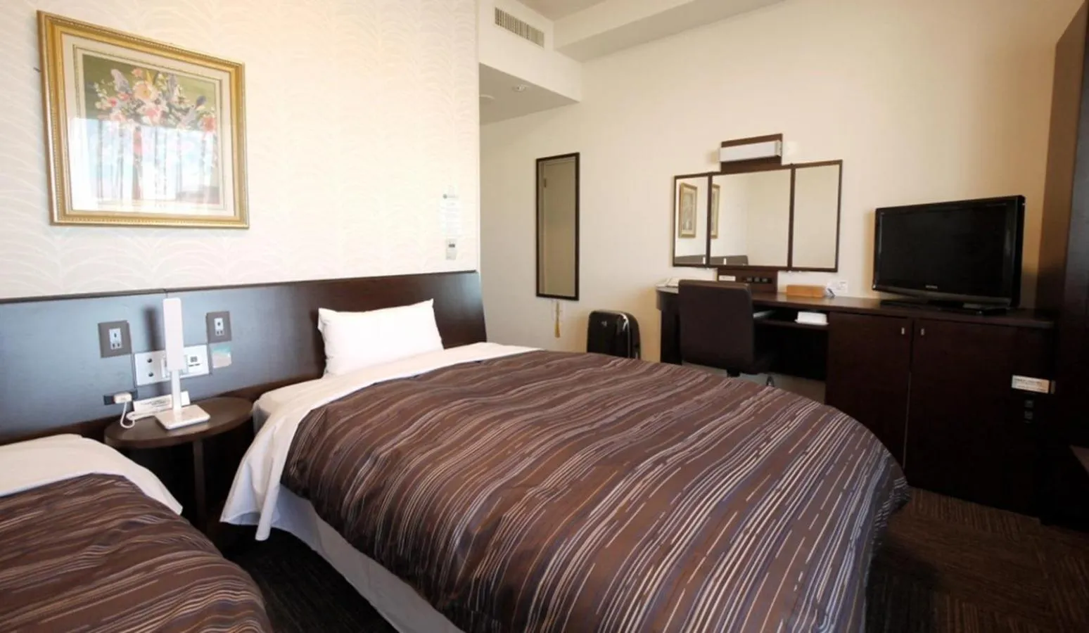 Photo of the whole room, Bed in Hotel Route-Inn Tomakomai Ekimae