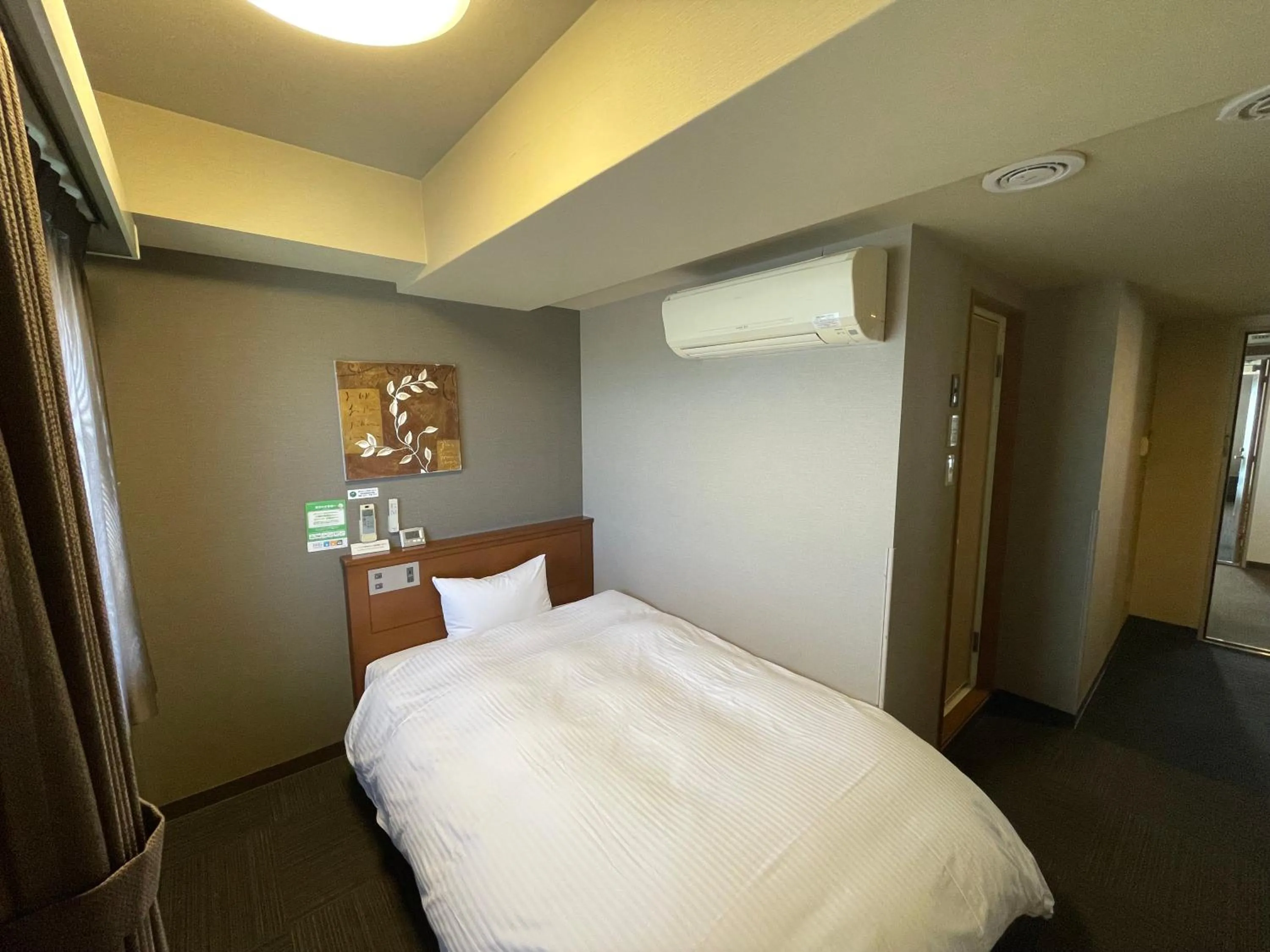 Bed in Hotel Route-Inn Misawa