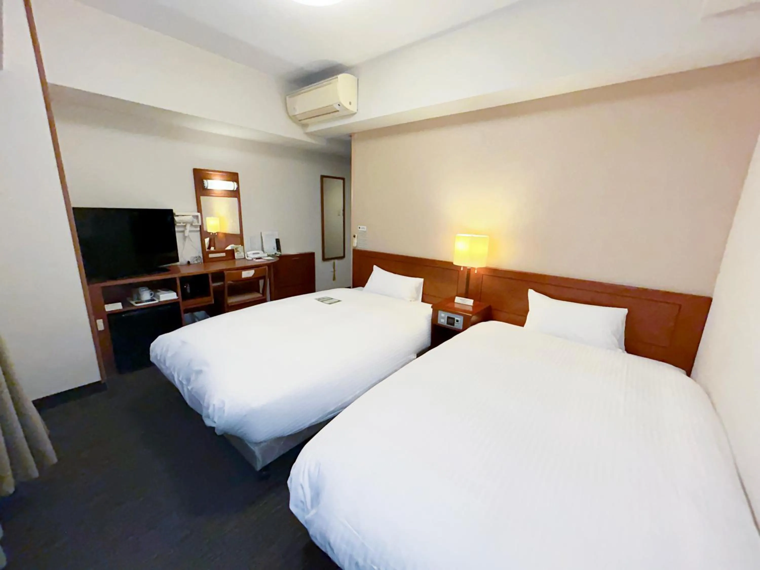 Bed in Hotel Route-Inn Tosu Ekimae