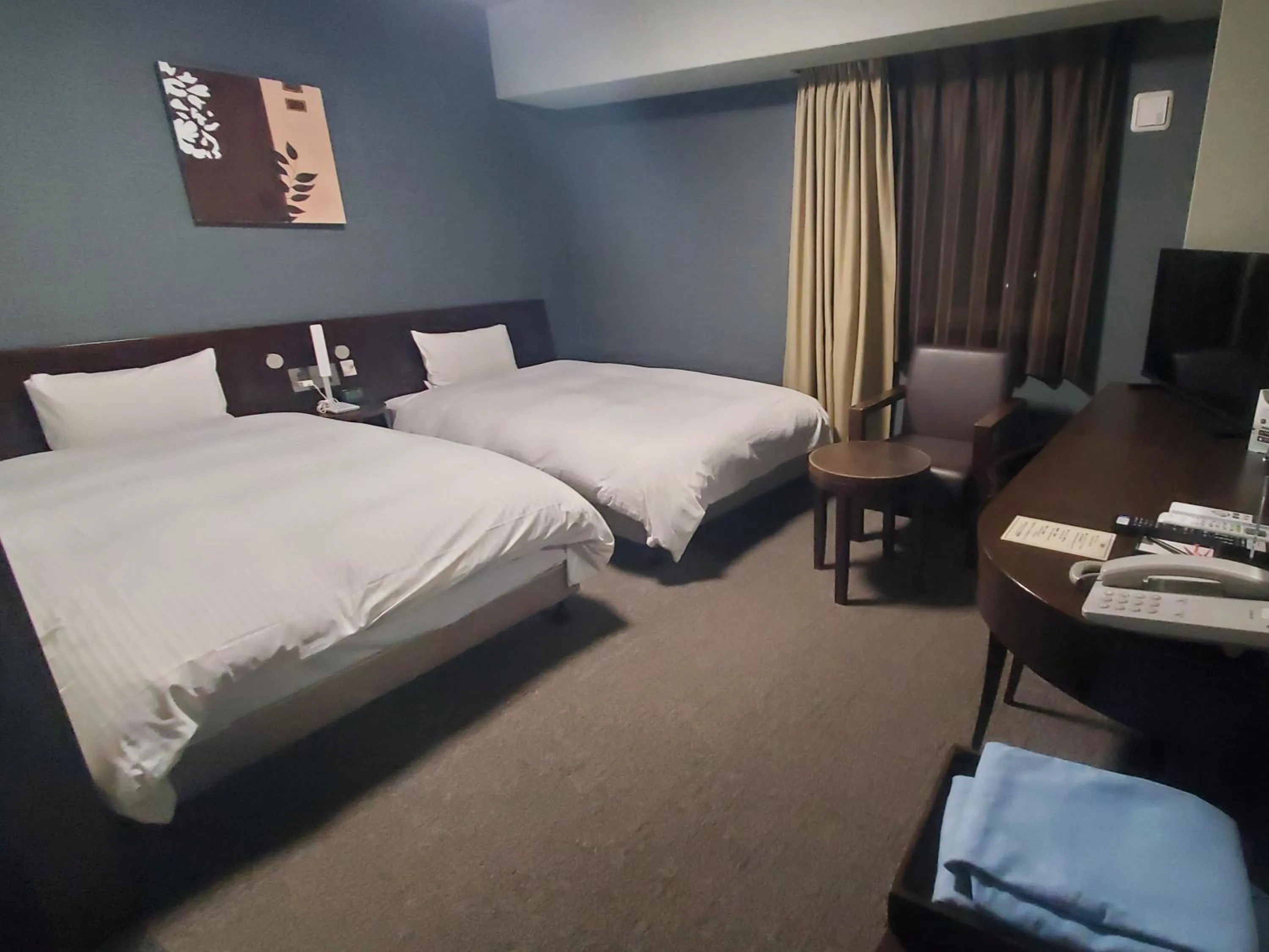 Photo of the whole room, Bed in Hotel Route-Inn Saga Ekimae
