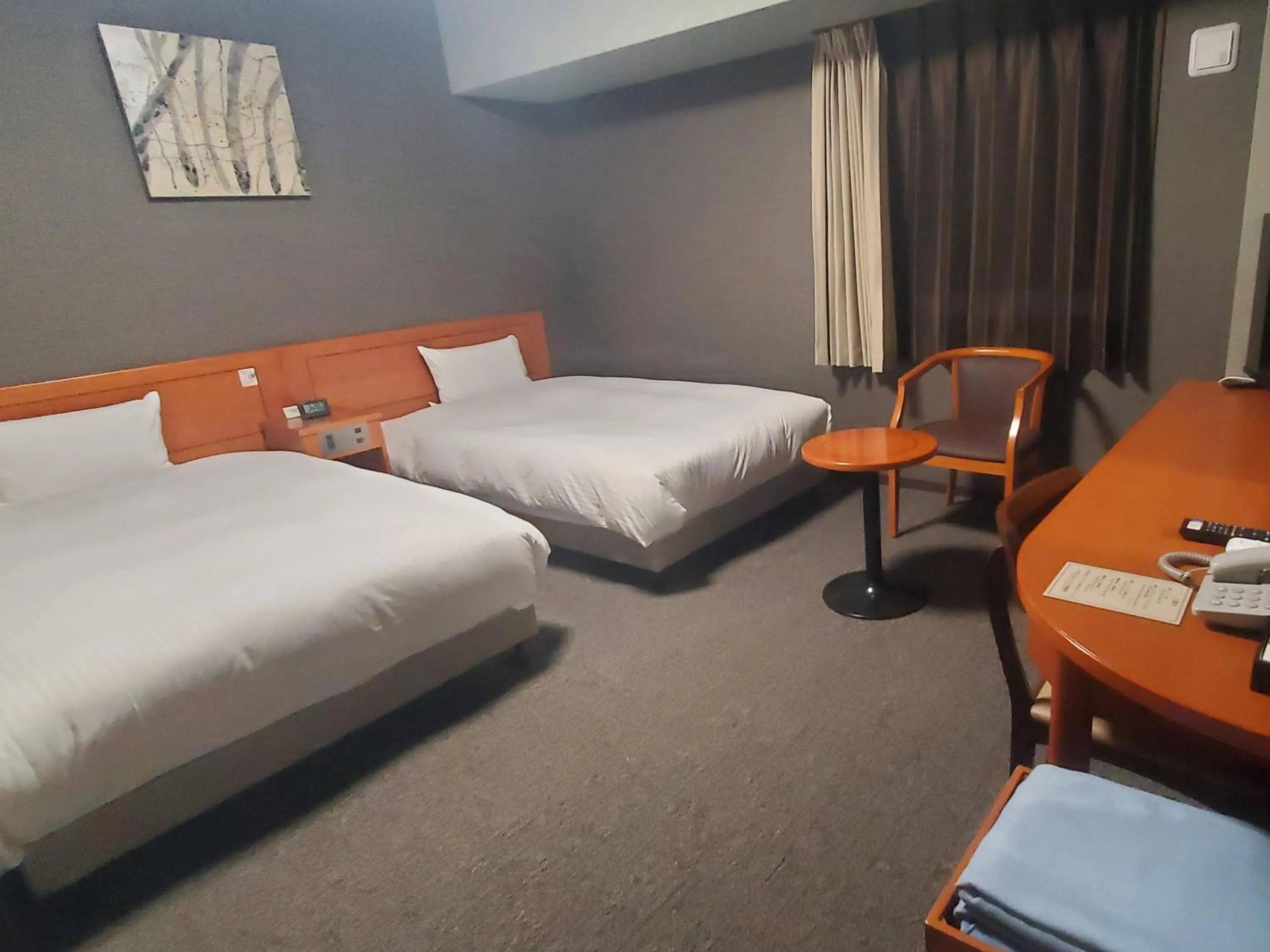 Photo of the whole room, Bed in Hotel Route-Inn Saga Ekimae