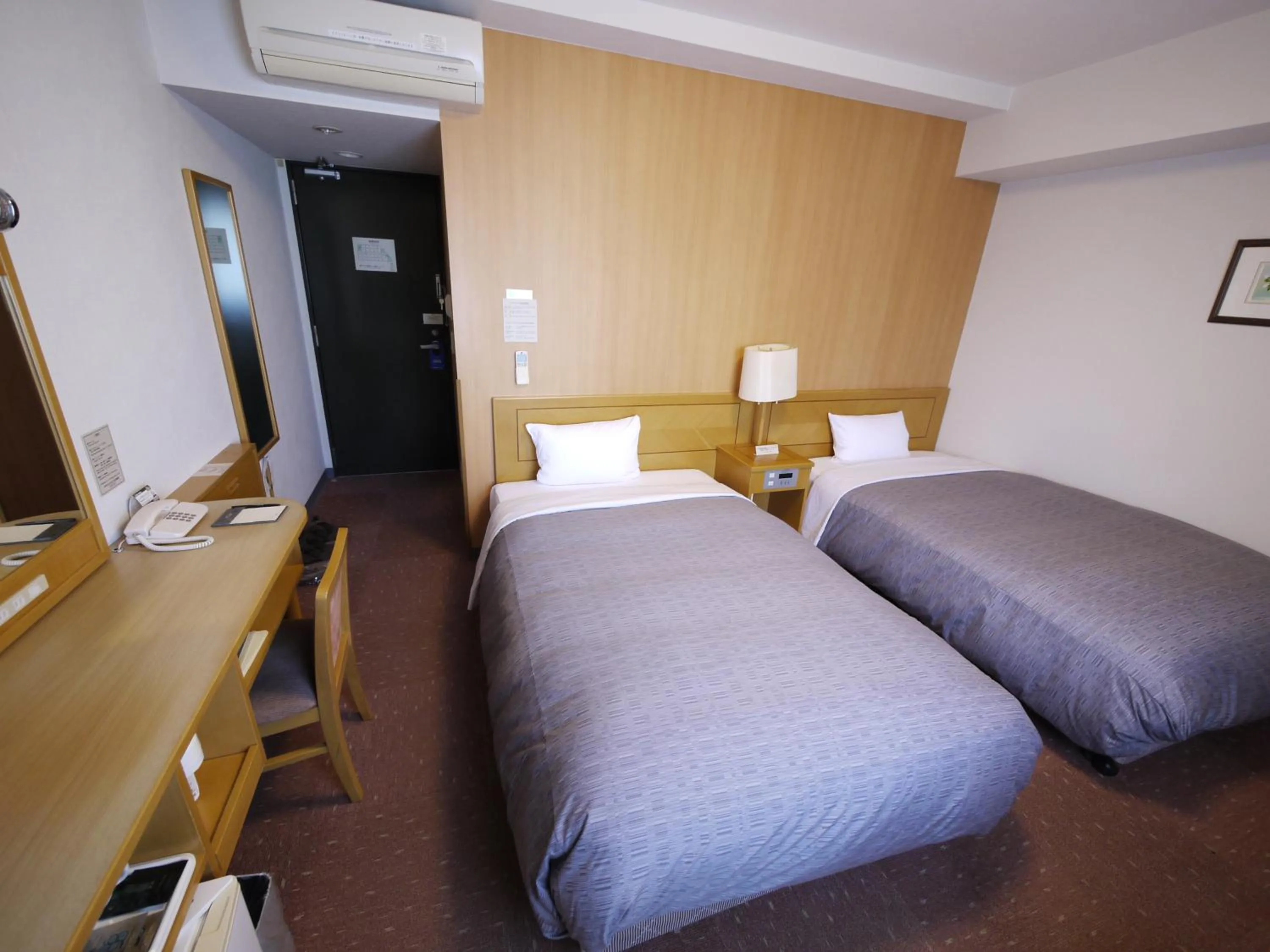 Photo of the whole room, Bed in Hotel Route-Inn Oita Ekimae