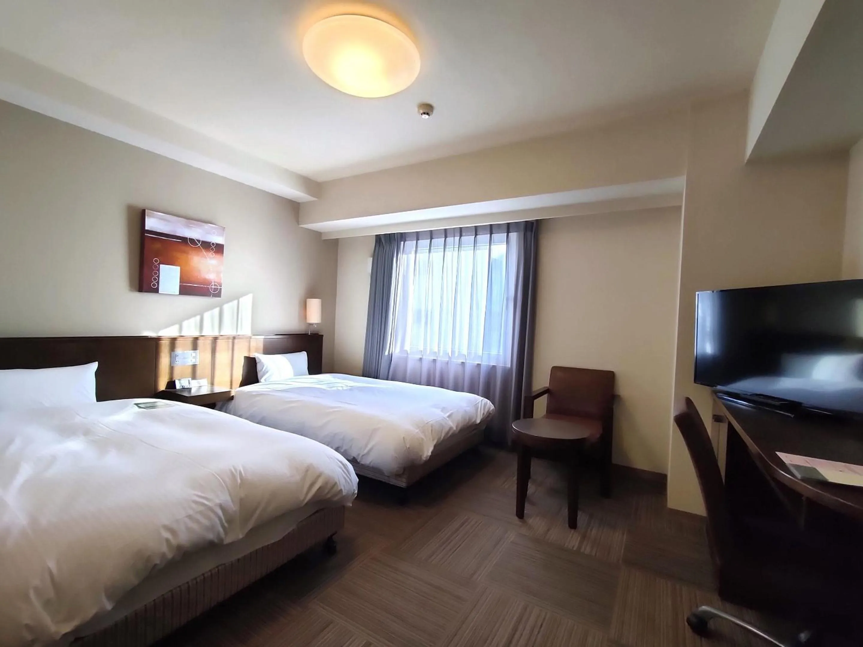 Photo of the whole room, Bed in Hotel Route-Inn Miyazaki Tachibana Dori
