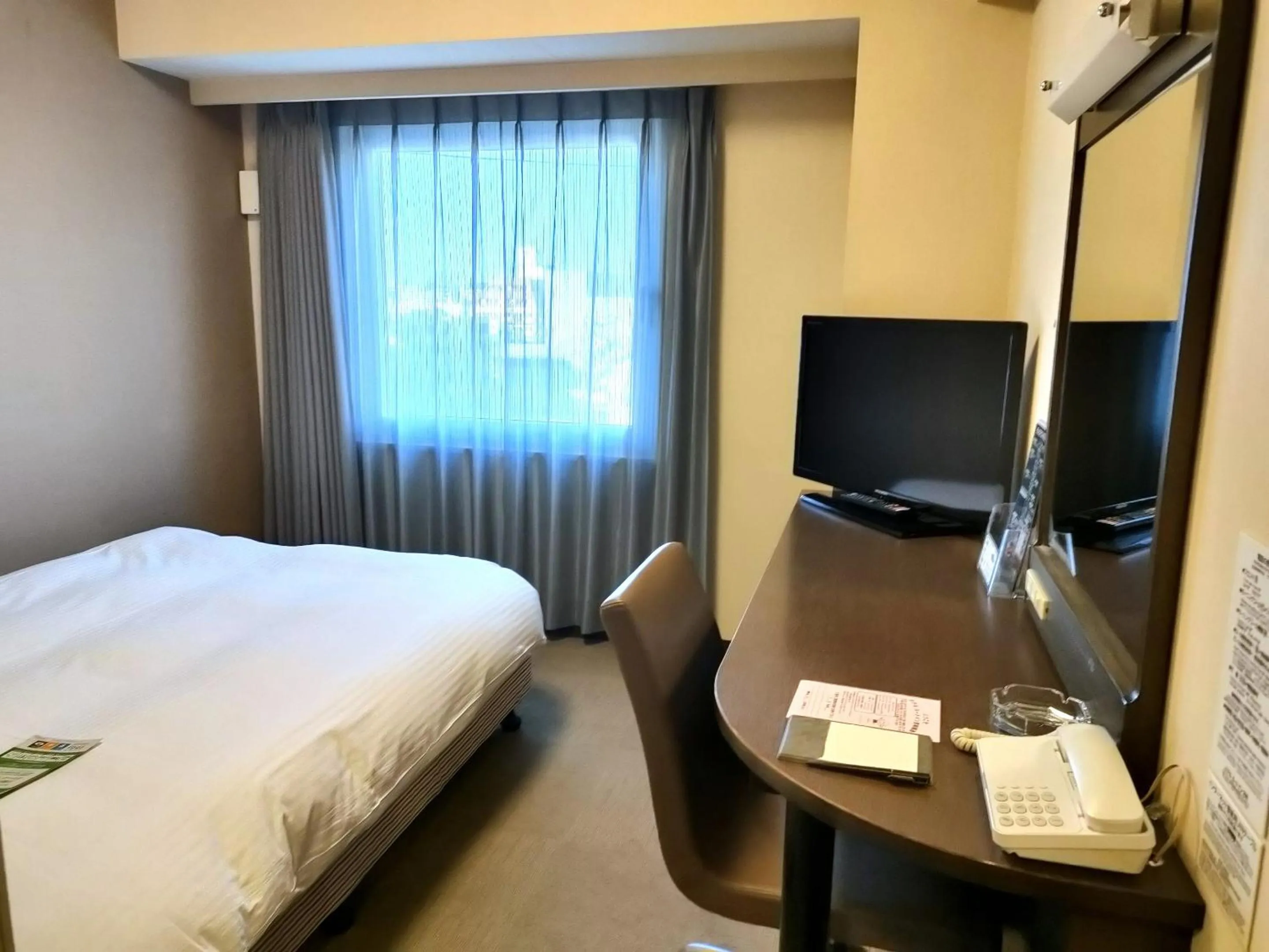 Photo of the whole room, Bed in Hotel Route-Inn Miyazaki Tachibana Dori