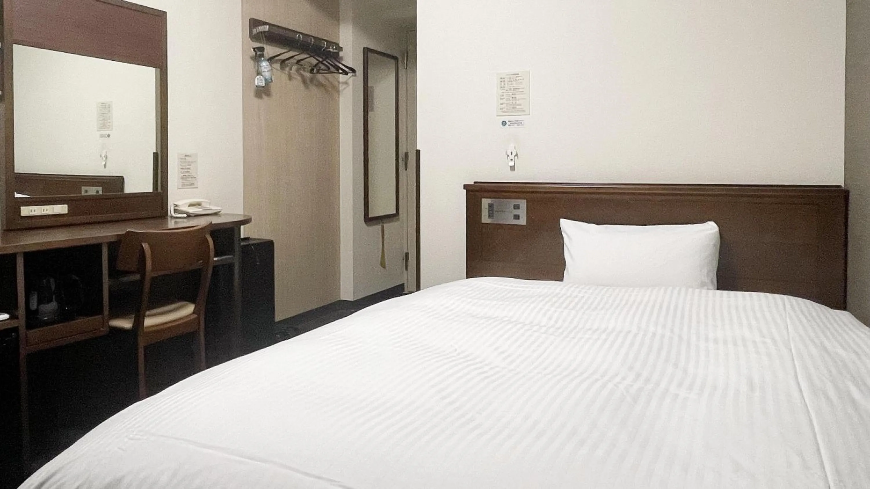 Photo of the whole room, Bed in Hotel Route-Inn Mitsukaido Ekimae