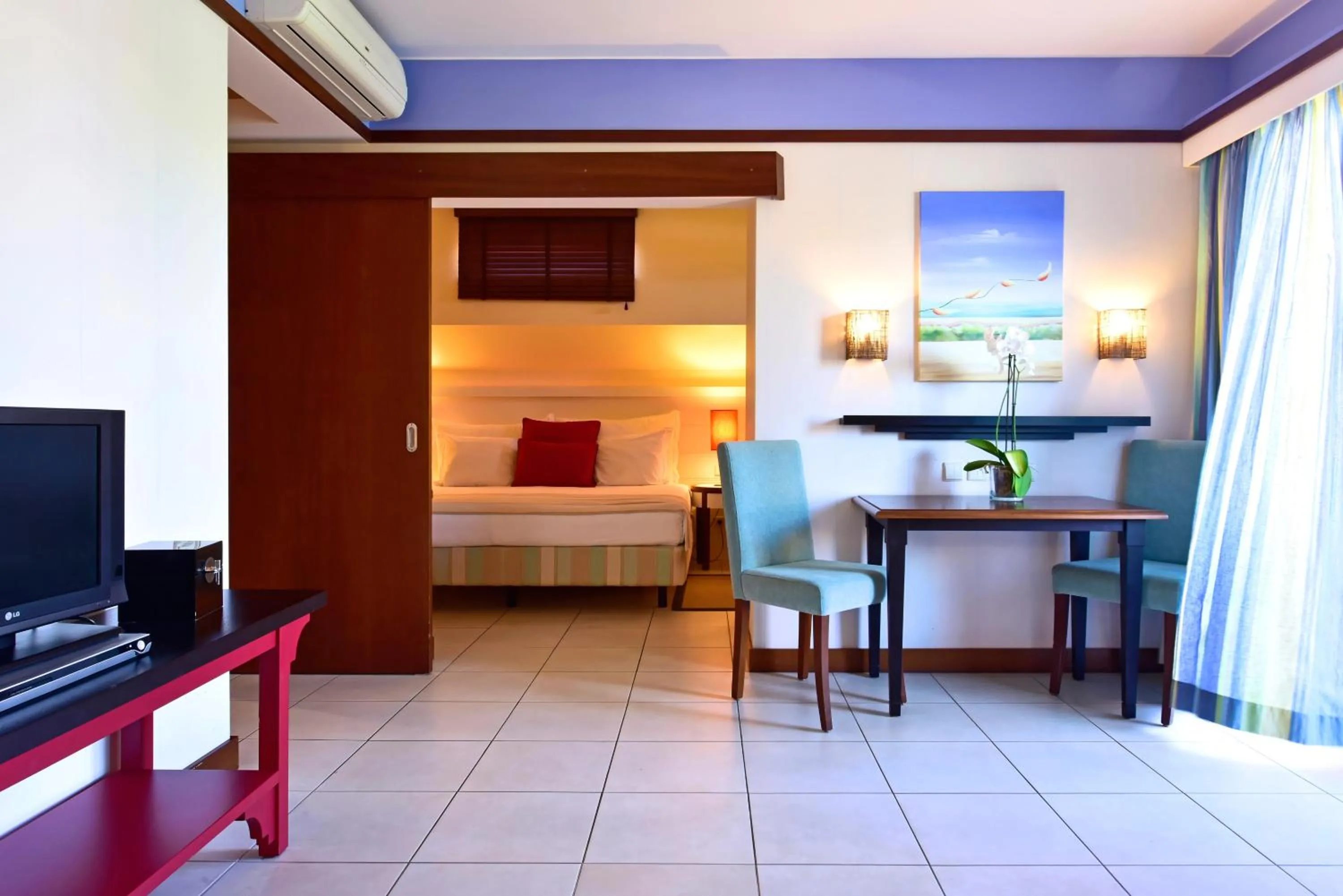 Living room, Bed in Pestana Porto Santo Premium All Inclusive Beach & SPA Resort