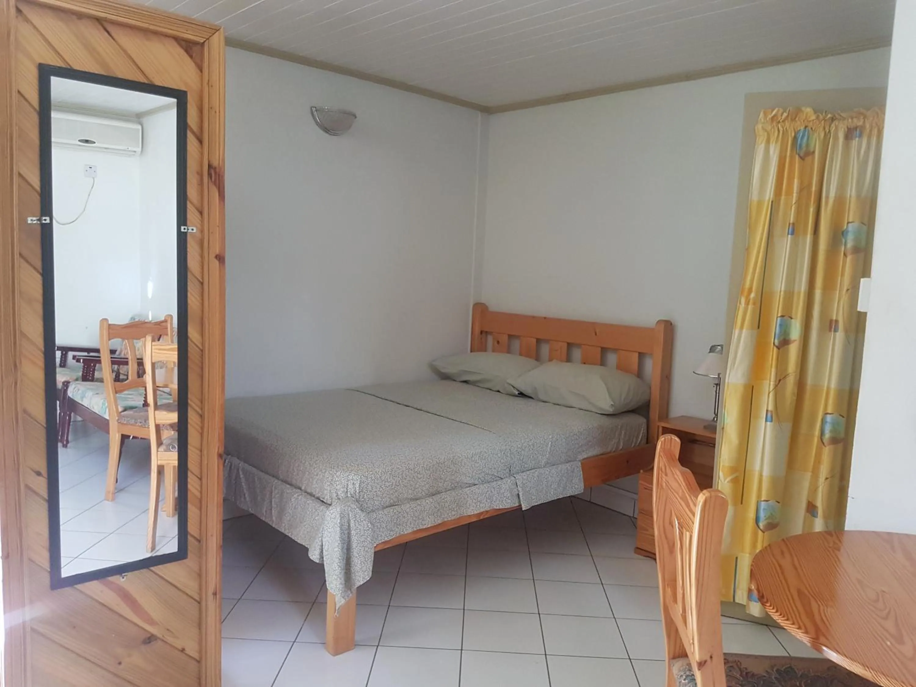 Bed in Coco Mango Suites