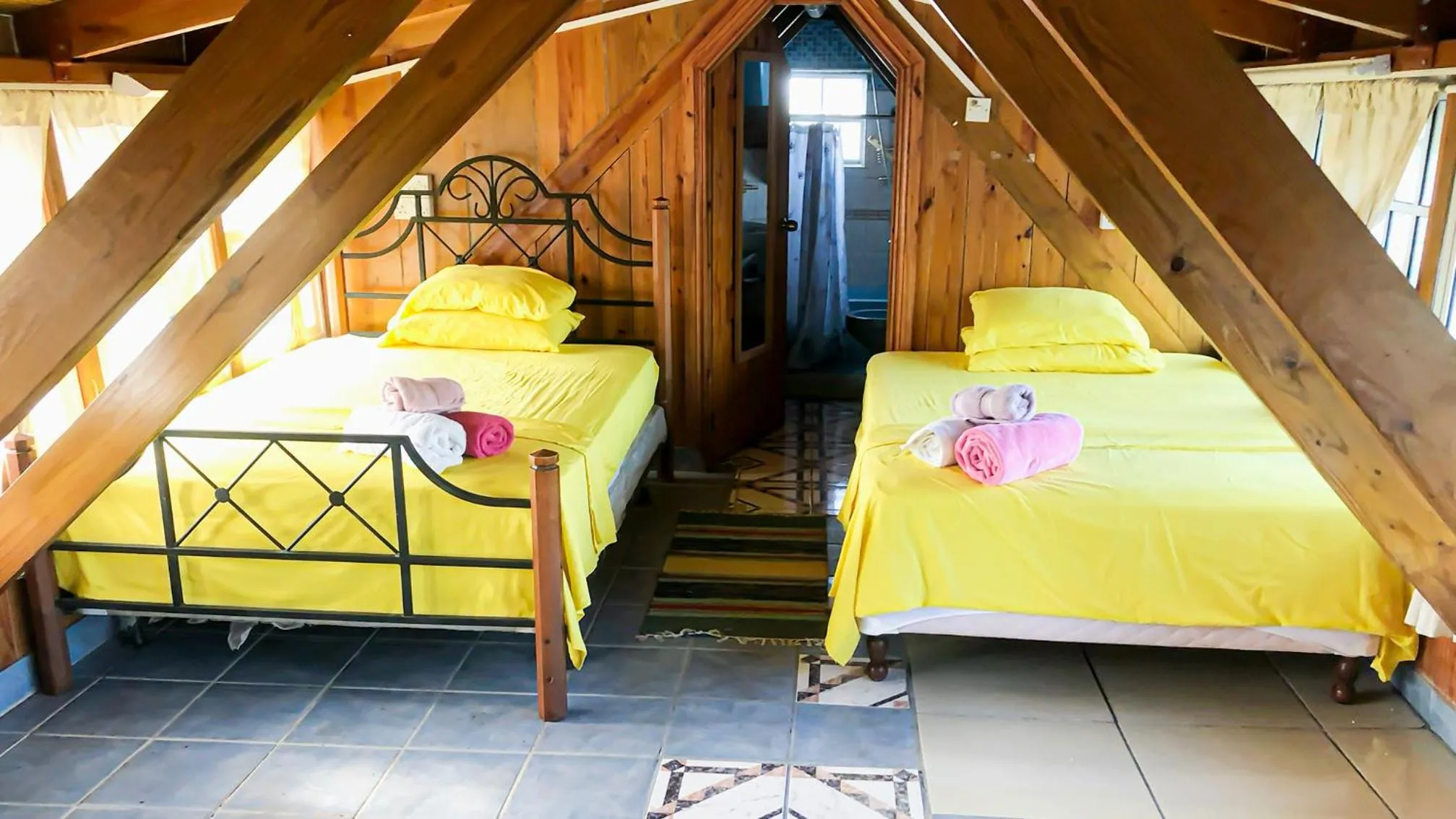 Bed in Coco Mango Suites