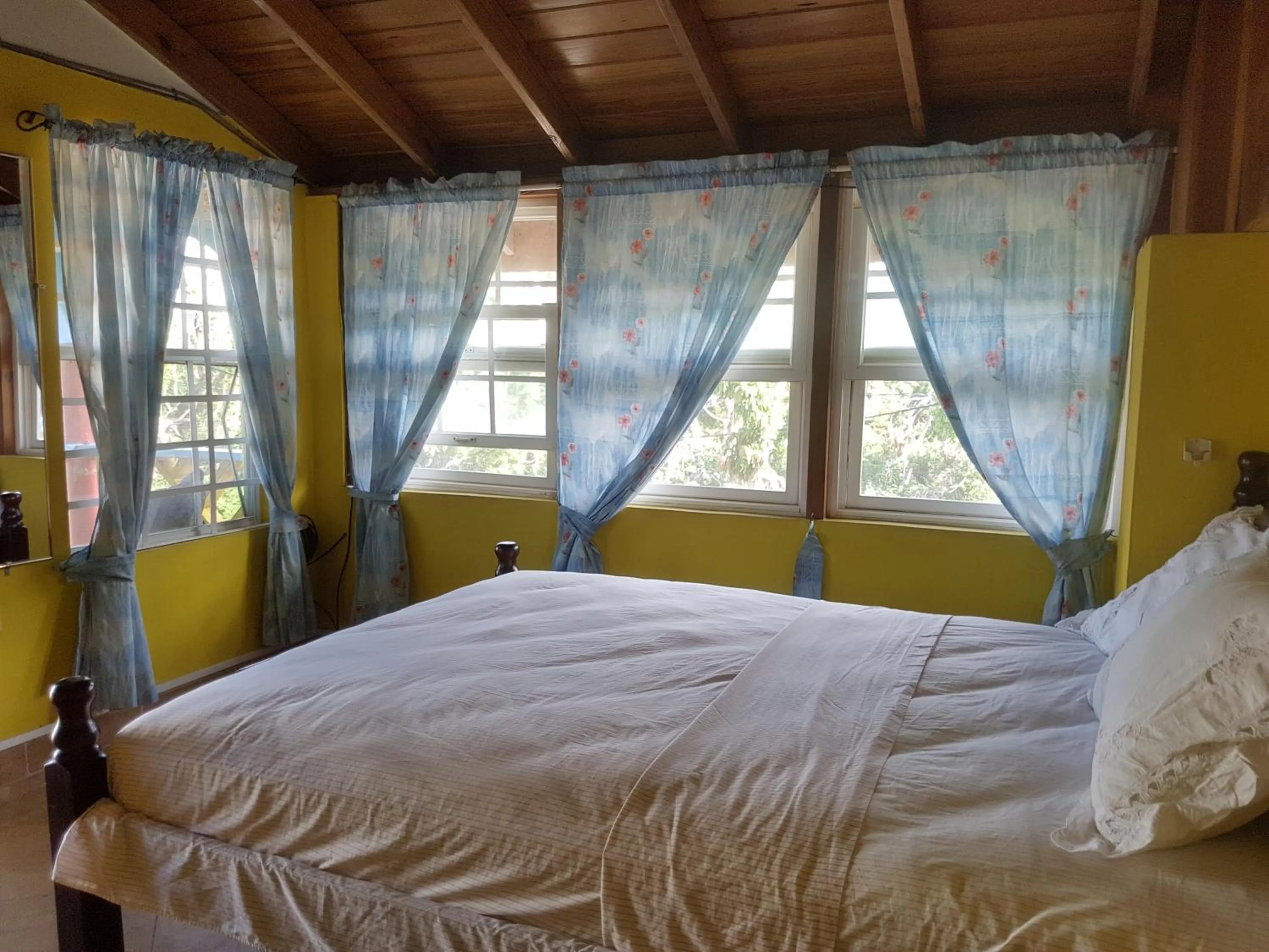 Bed in Coco Mango Suites