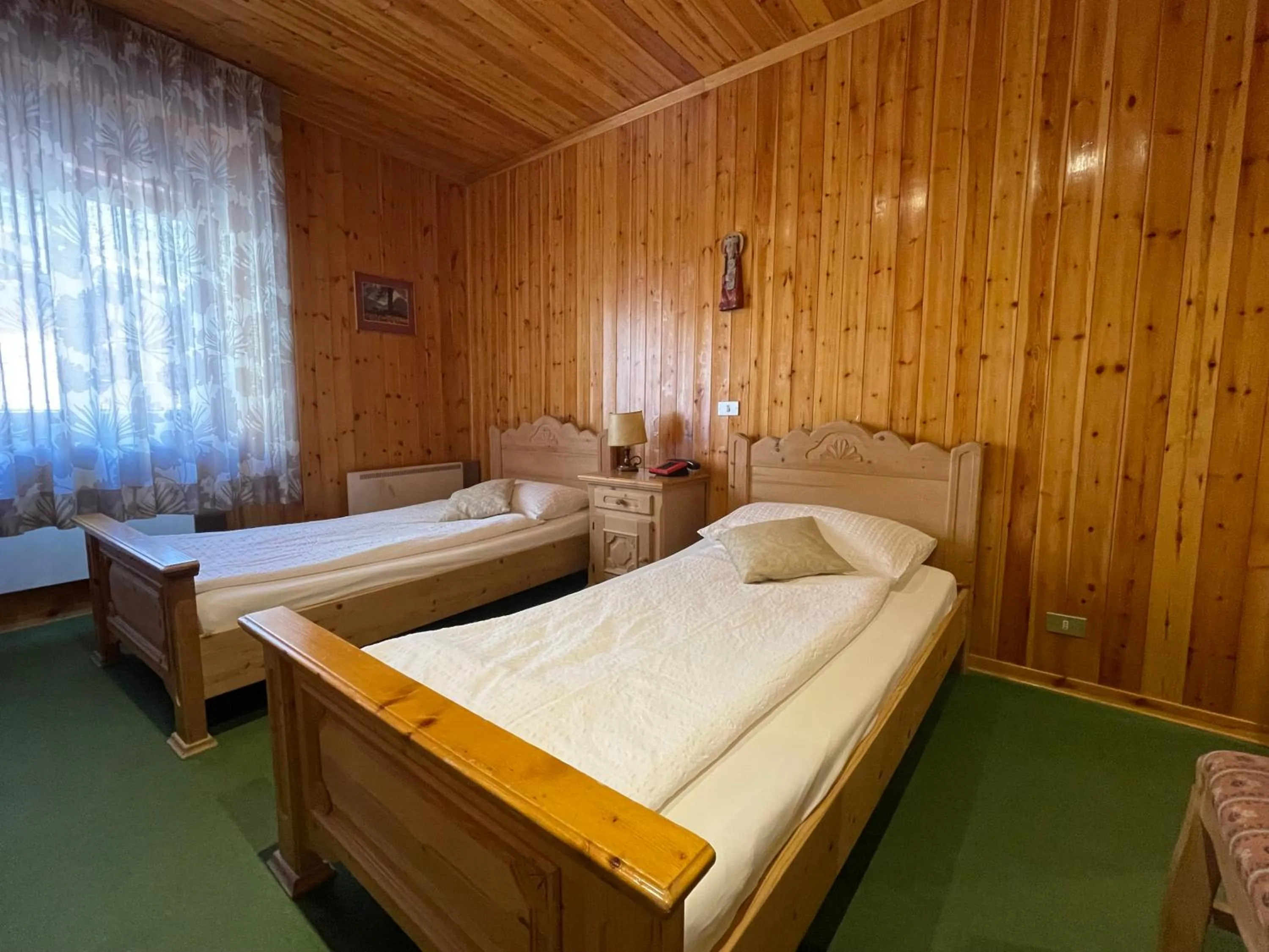 Bed in Villaggio Hotel Aquila