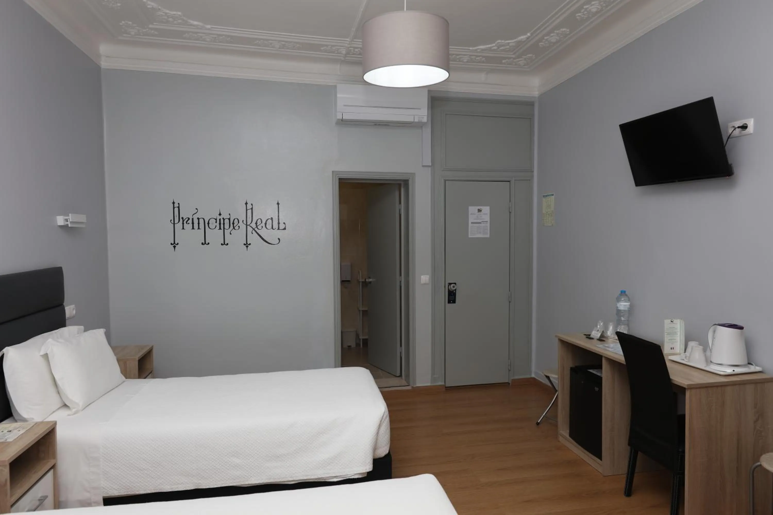 Bed in O Elétrico Guesthouse