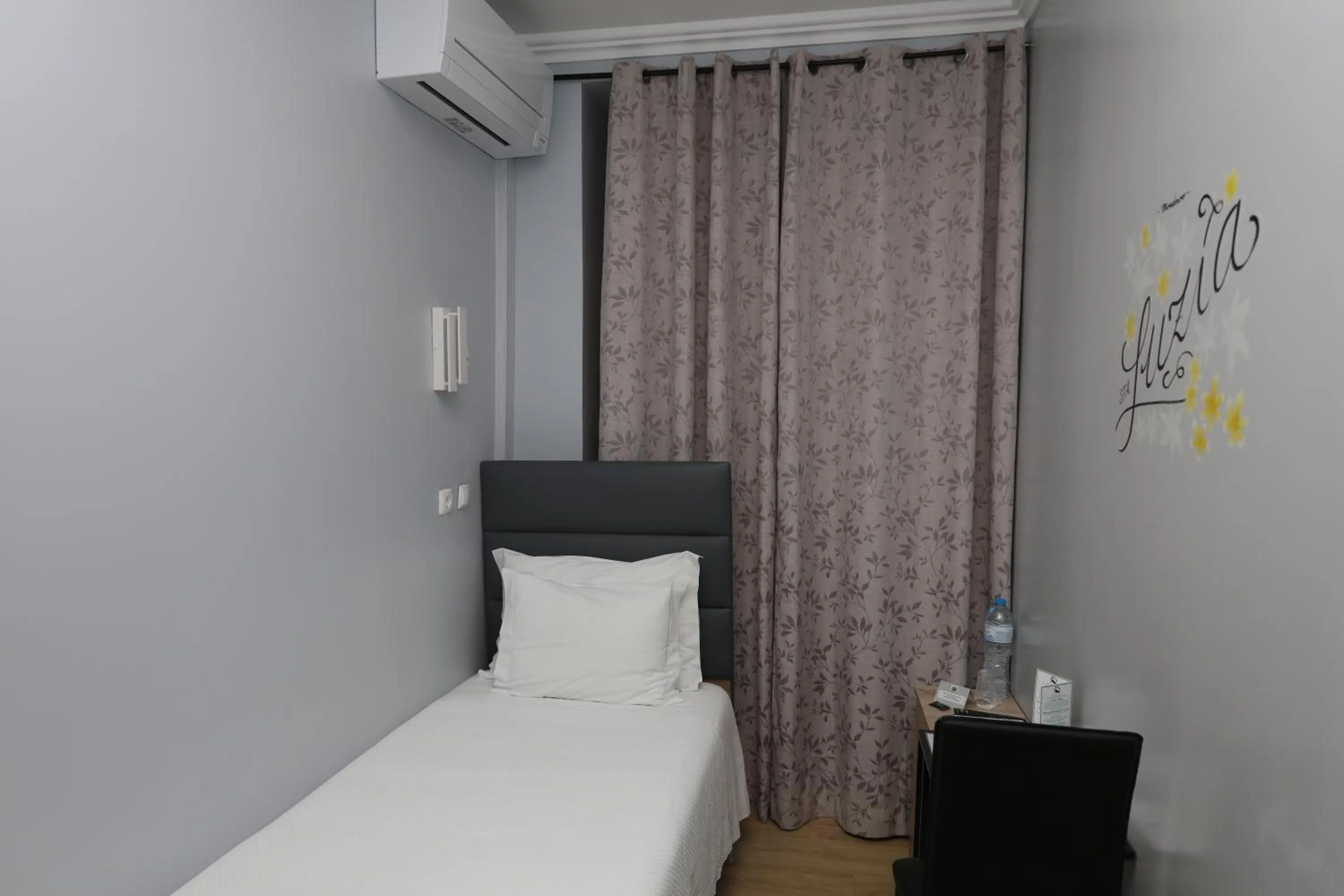 Bed in O Elétrico Guesthouse