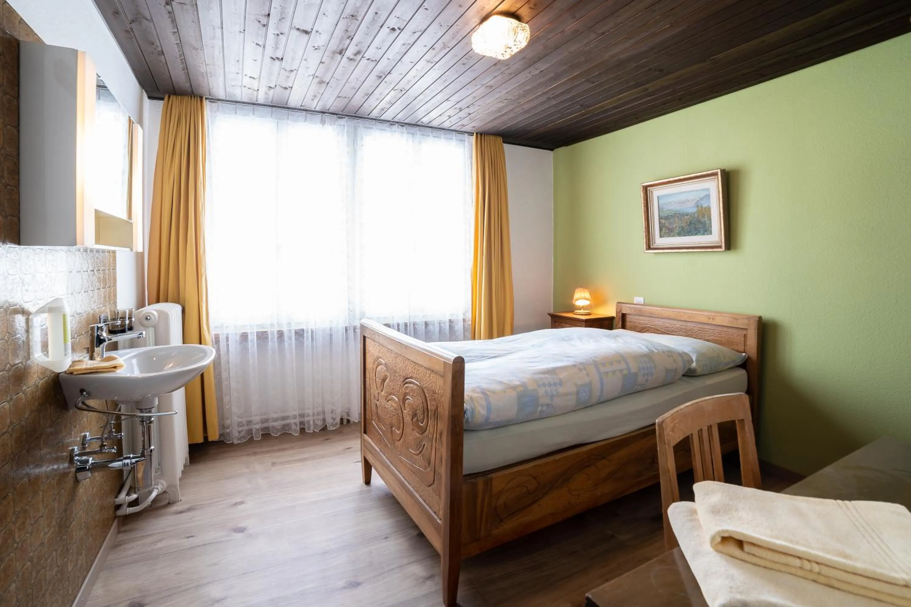 Photo of the whole room, Bed in Gasthaus Friedegg