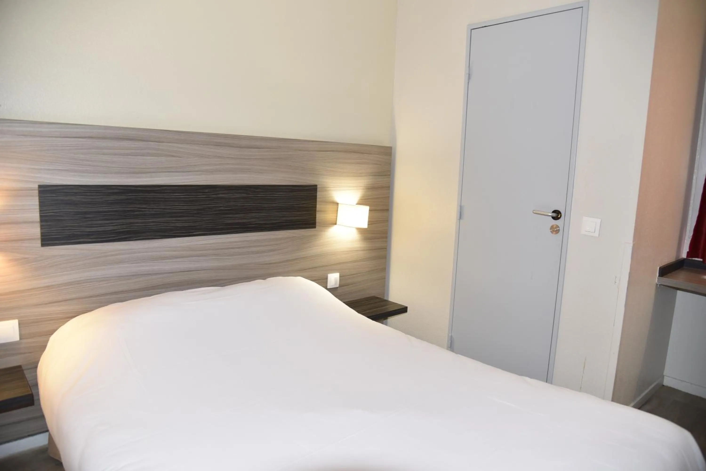 Bed in Hotel du Triangle