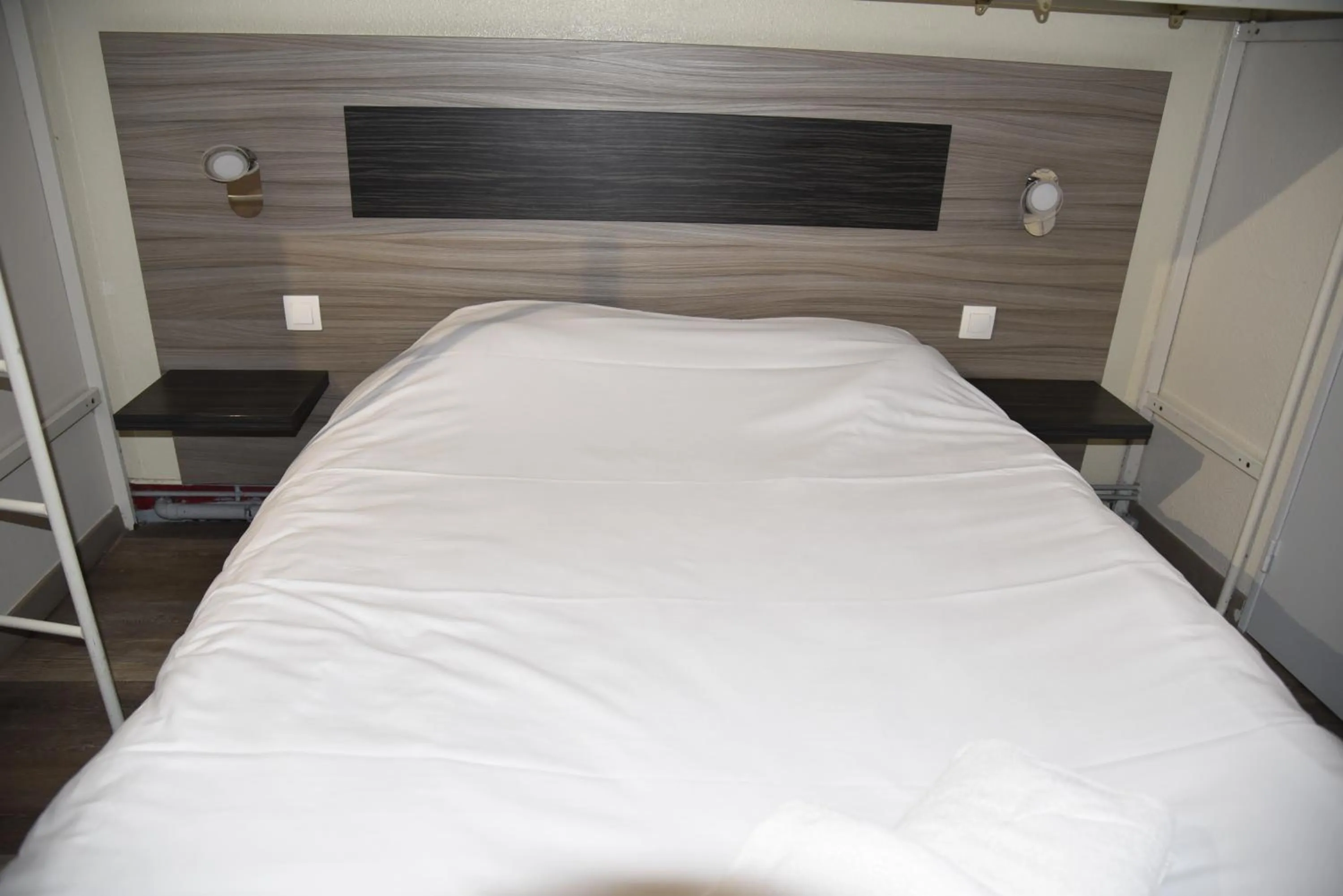 Bed in Hotel du Triangle