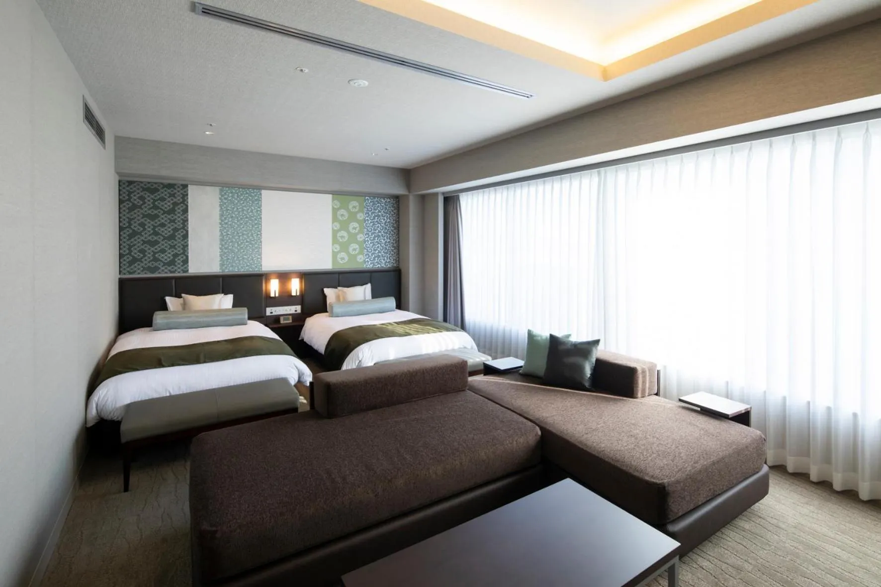 Living room, Bed in Kyoto U-BELL Hotel