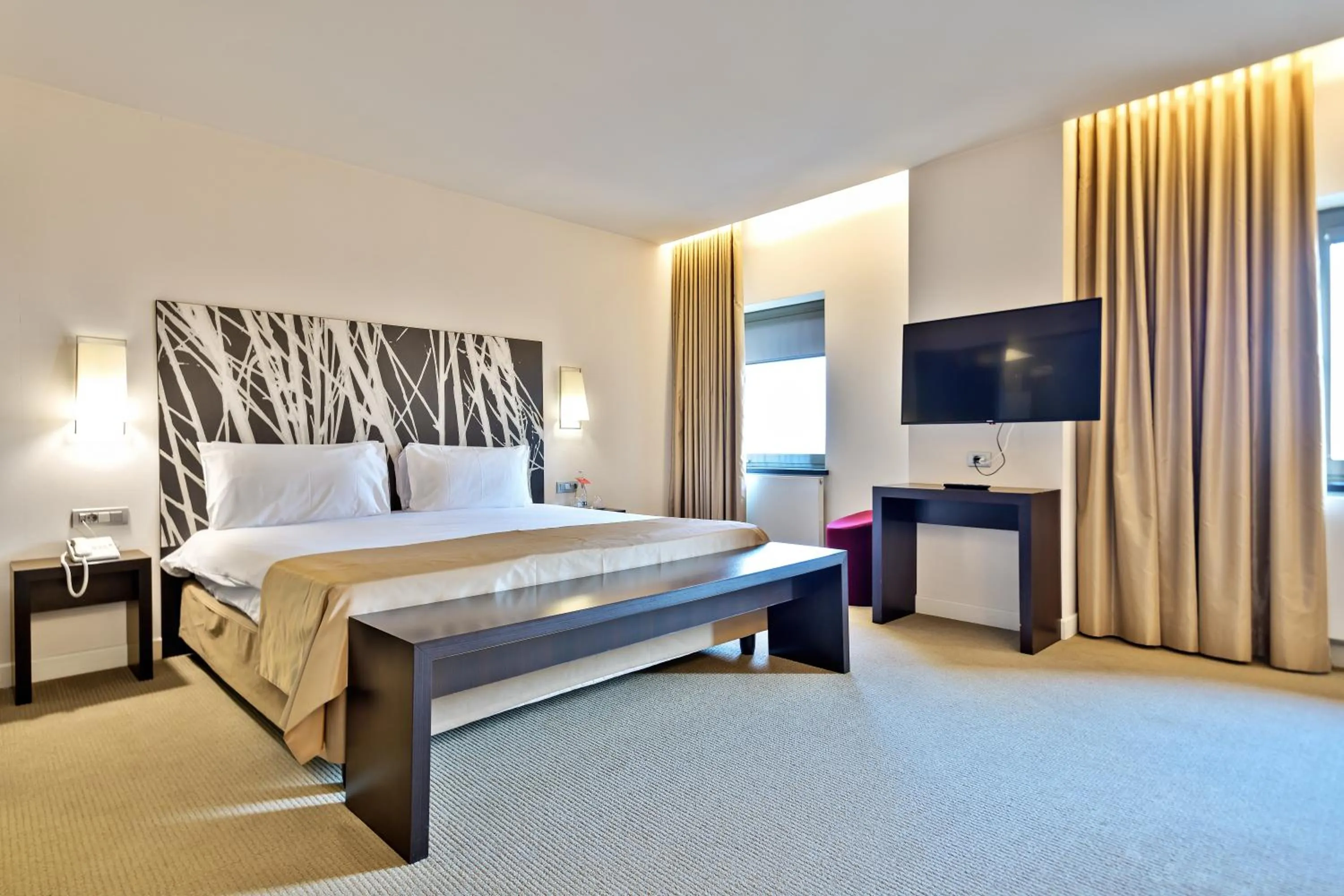 Photo of the whole room, Bed in Ramada Plaza by Wyndham Bucharest Convention Center